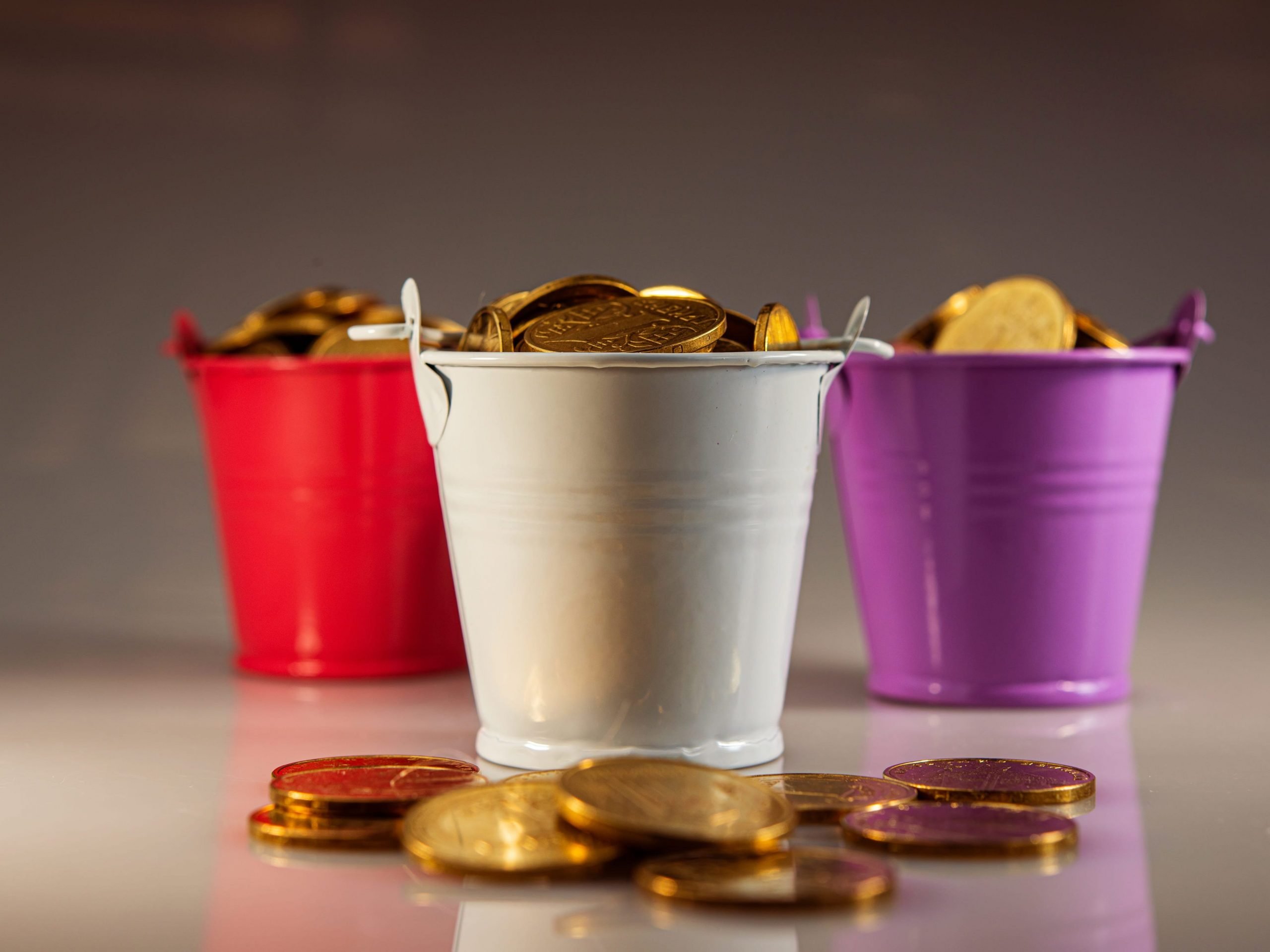 Three buckets of gold coins