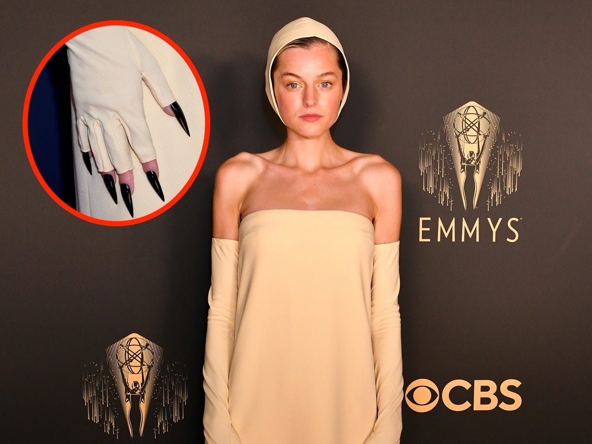 A photo of Emma Corrin at the Emmys with an inset of her nails.