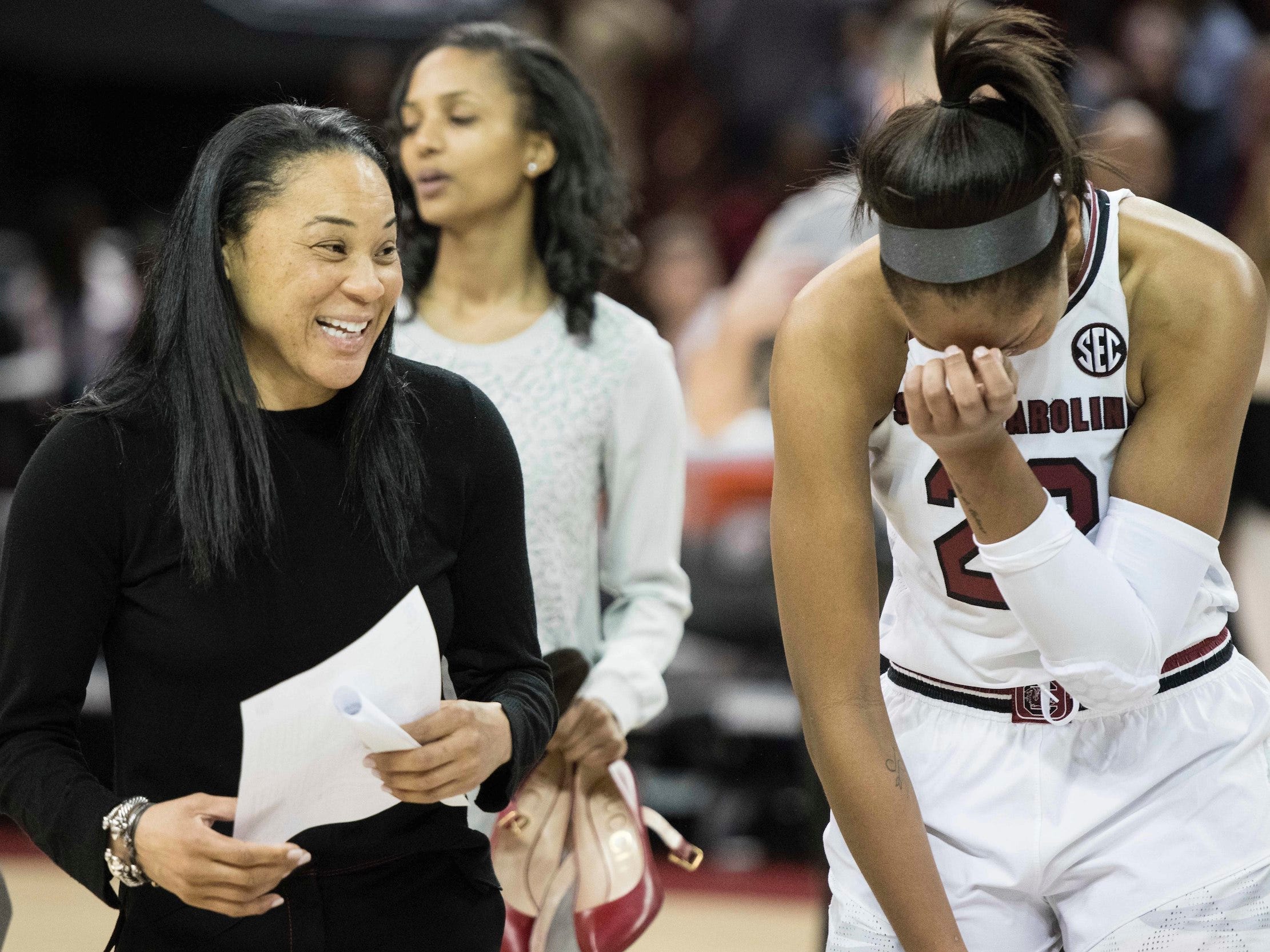 Dawn Staley jokes with A'ja Wilson.