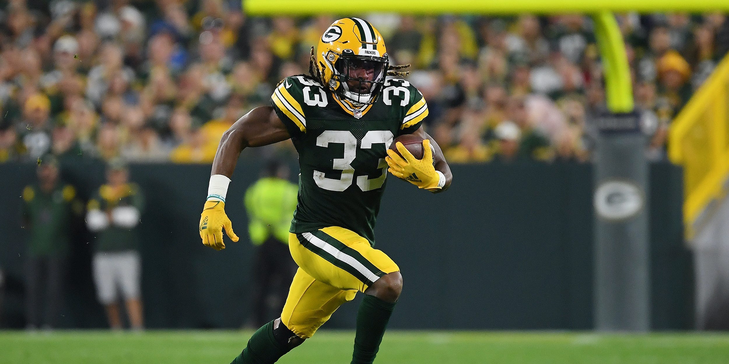 Aaron Jones of the Green Bay Packers plays against the Detroit Lions.