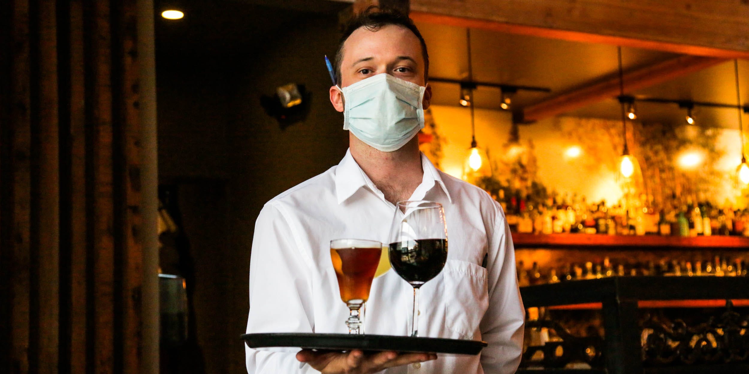 dining out eating at restaurant pandemic coronavirus mask waiter cocktails