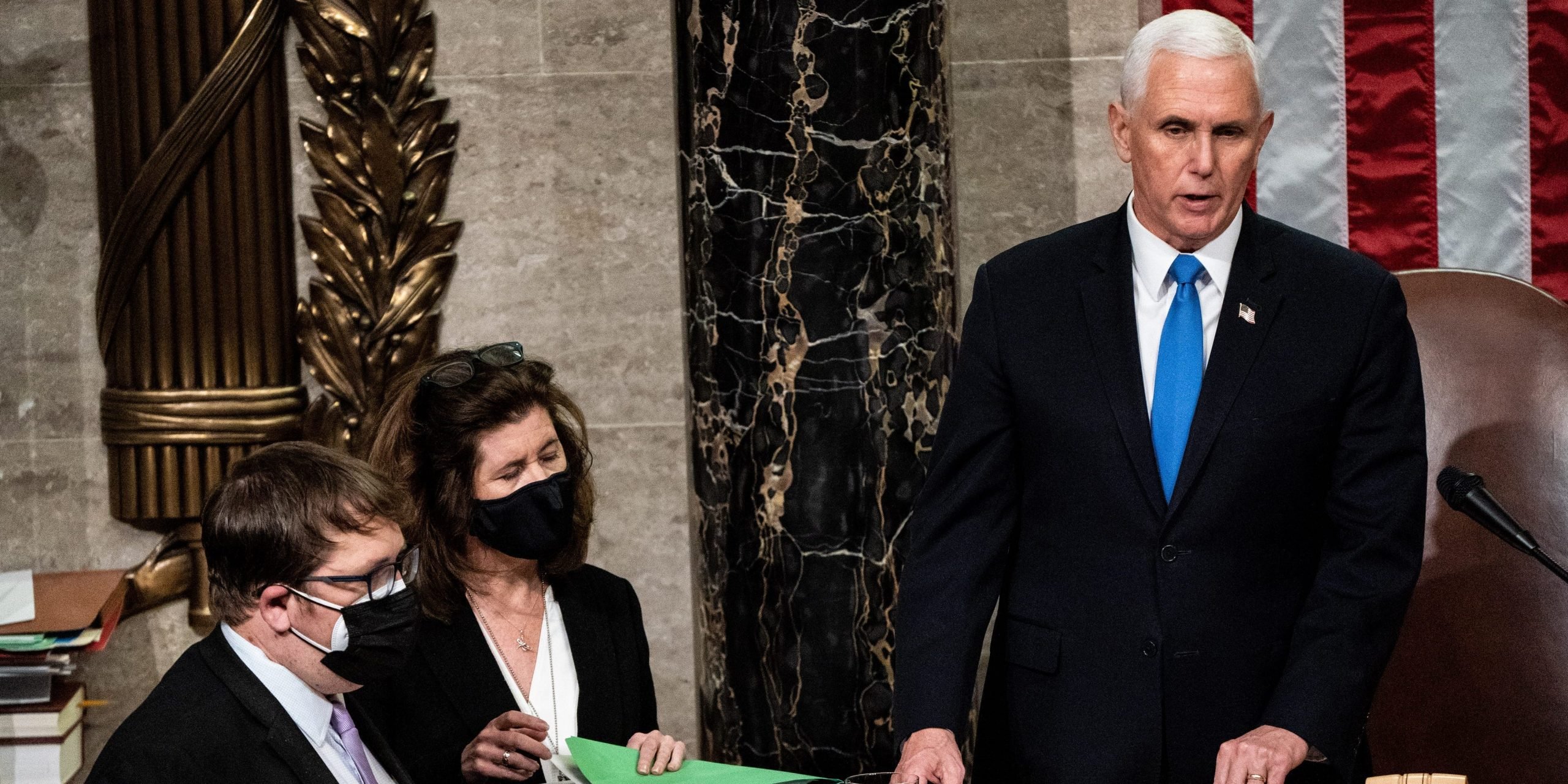 Mike Pence in the US Senate next to two aides.