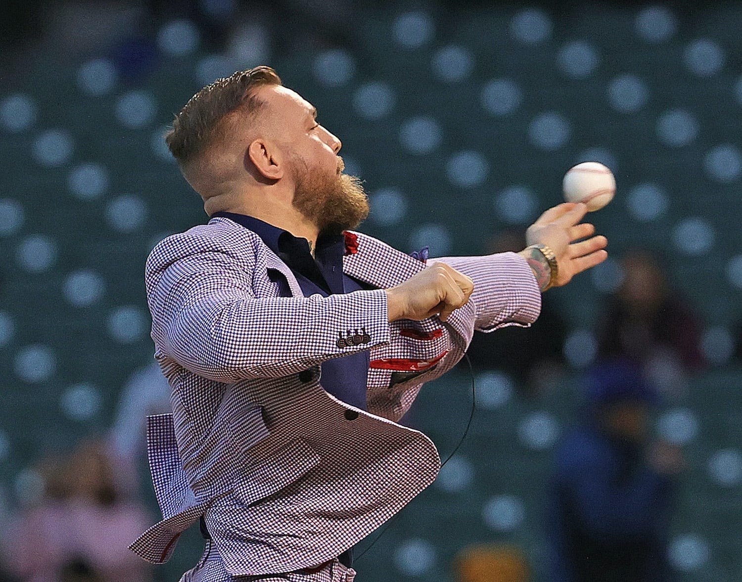 Conor McGregor threw the ceremonial first pitch before the Chicago Cubs played the Minnesota Twins at Wrigley Field on September 21.