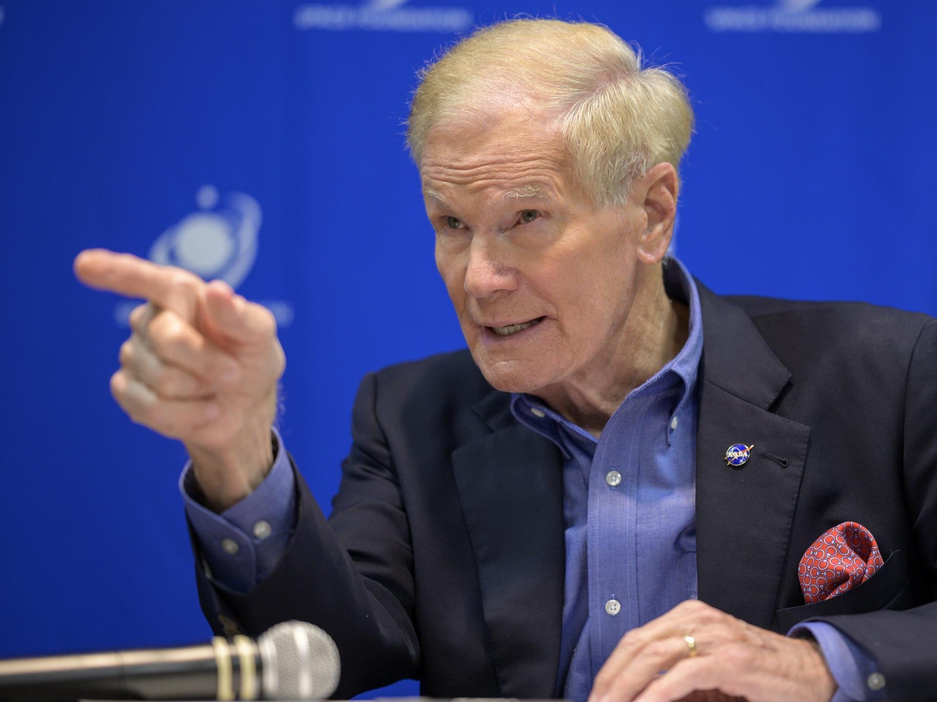 NASA Administrator Bill Nelson sitting at a table pointing a finger