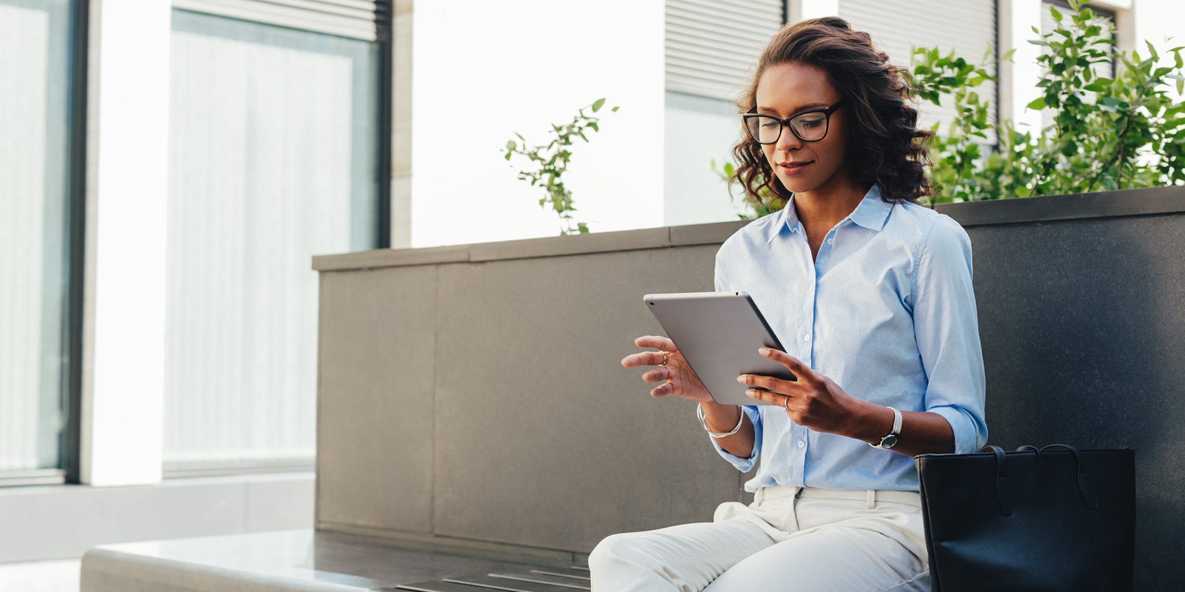 woman using ipad