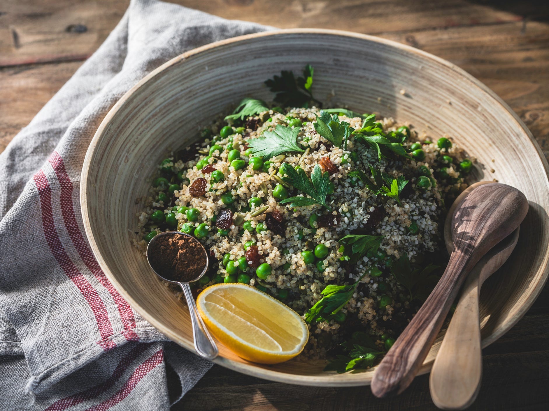 A quinoa bowl with various greens.