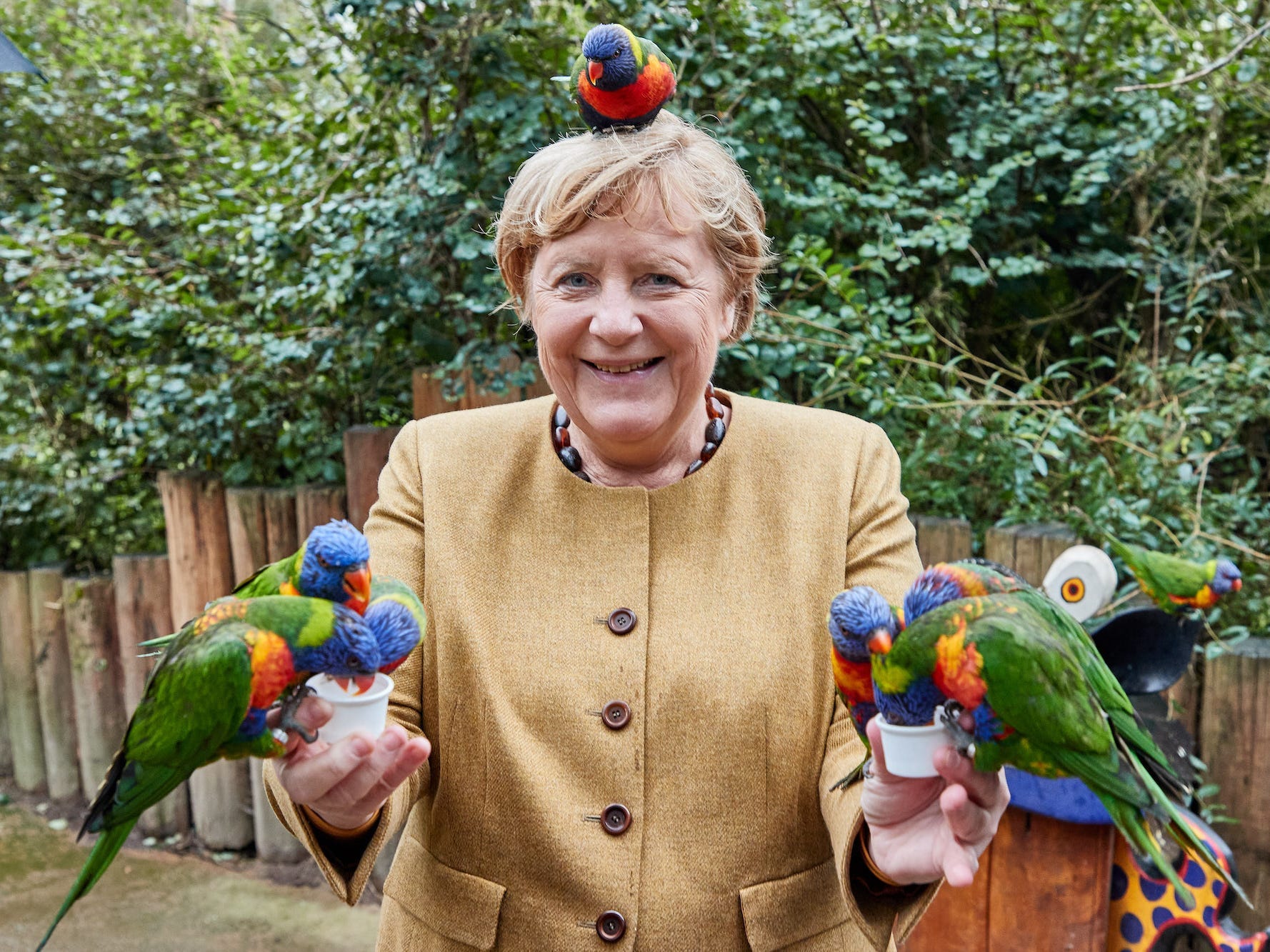 Angela Merkel with birds.