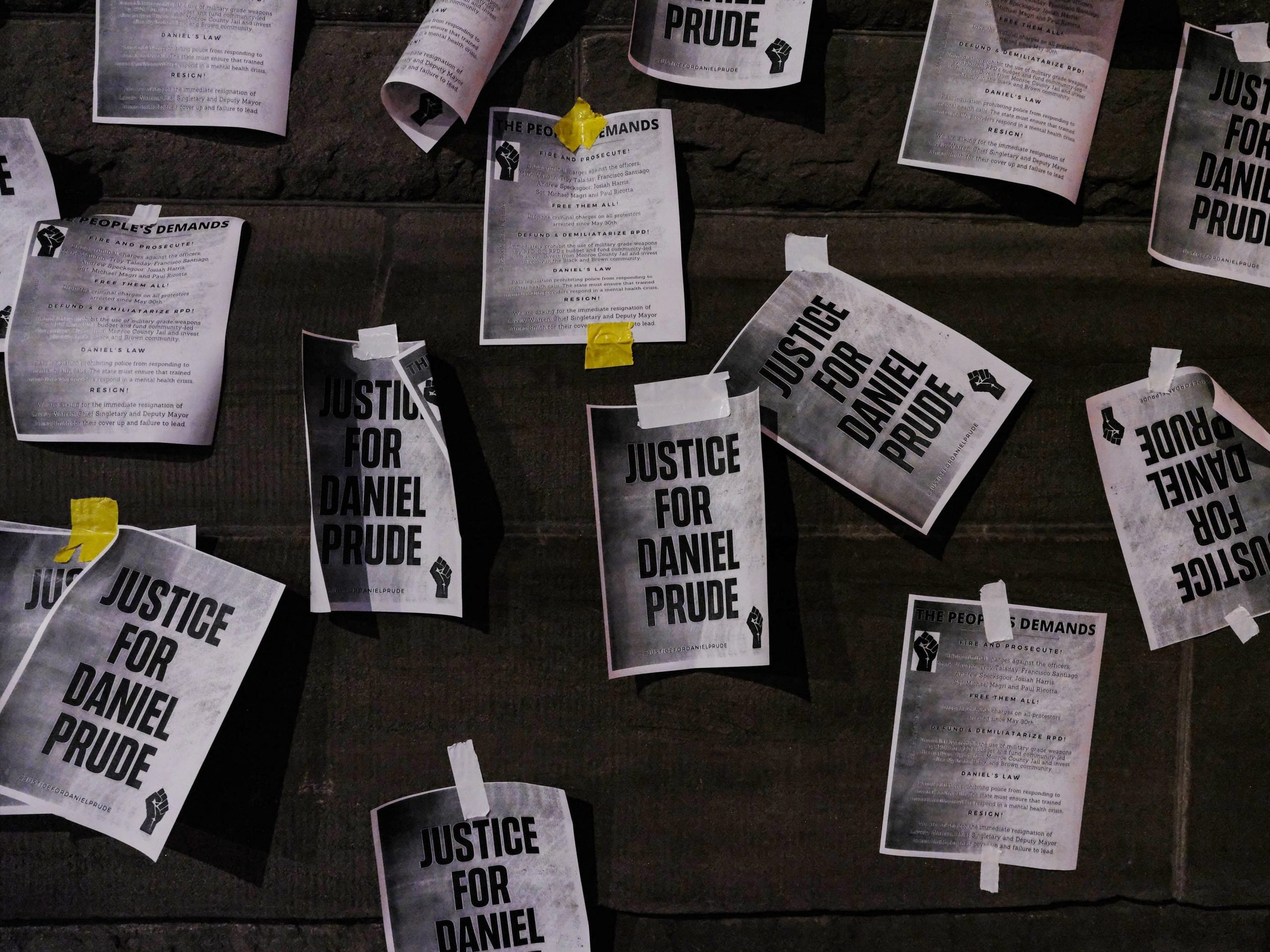 Notices reading "Justice for Daniel Prude" are pasted on the exterior walls of City Hall in protest of the police killing of Daniel Prude on September 8, 2020, in Rochester, New York.