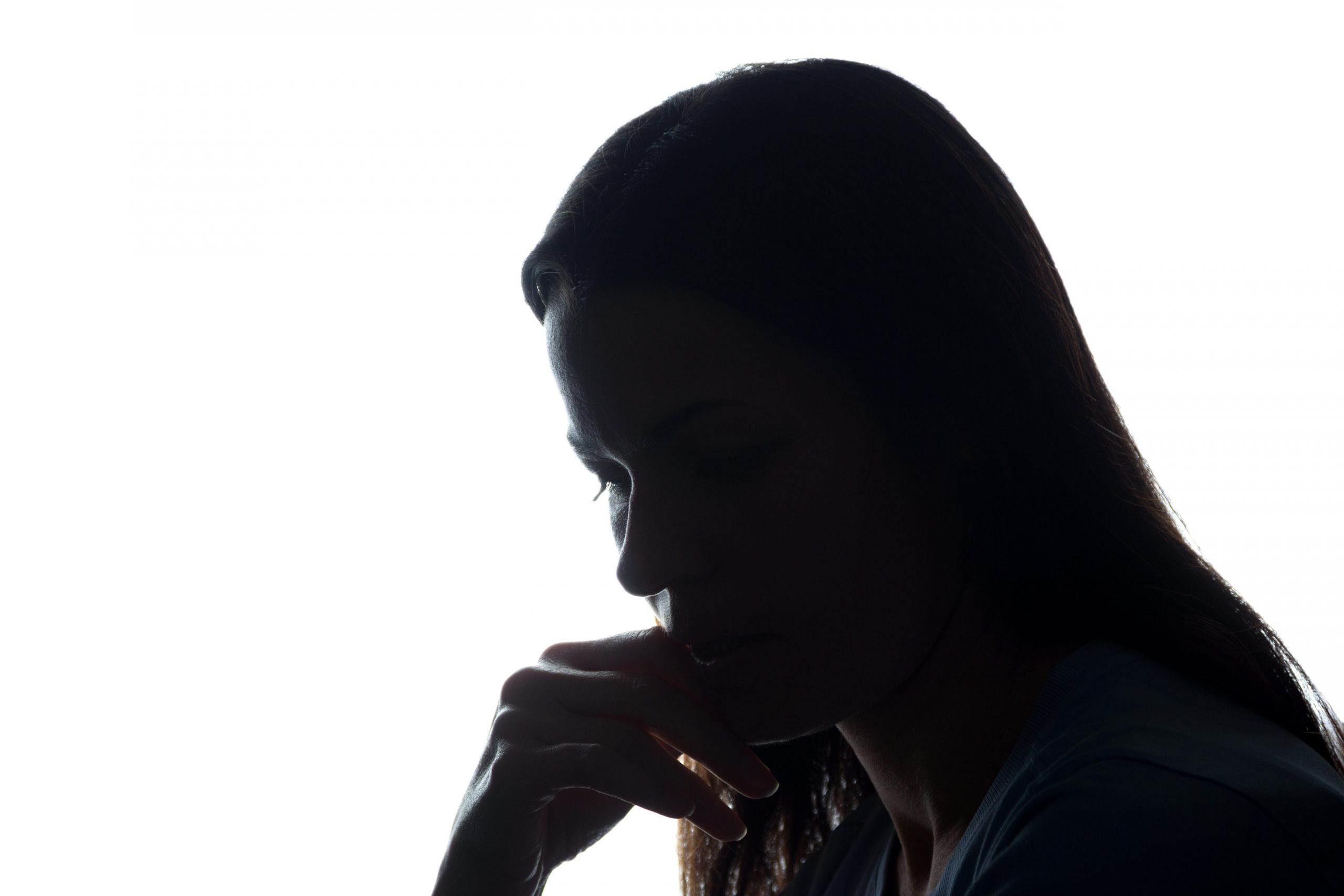 silhouette of woman contemplative