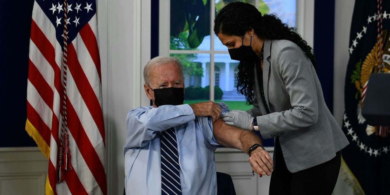 US President Joe Biden receives a third shot of the Pfizer Covid-19 vaccine as a booster on the White House campus September 27, 2021, in Washington, DC.