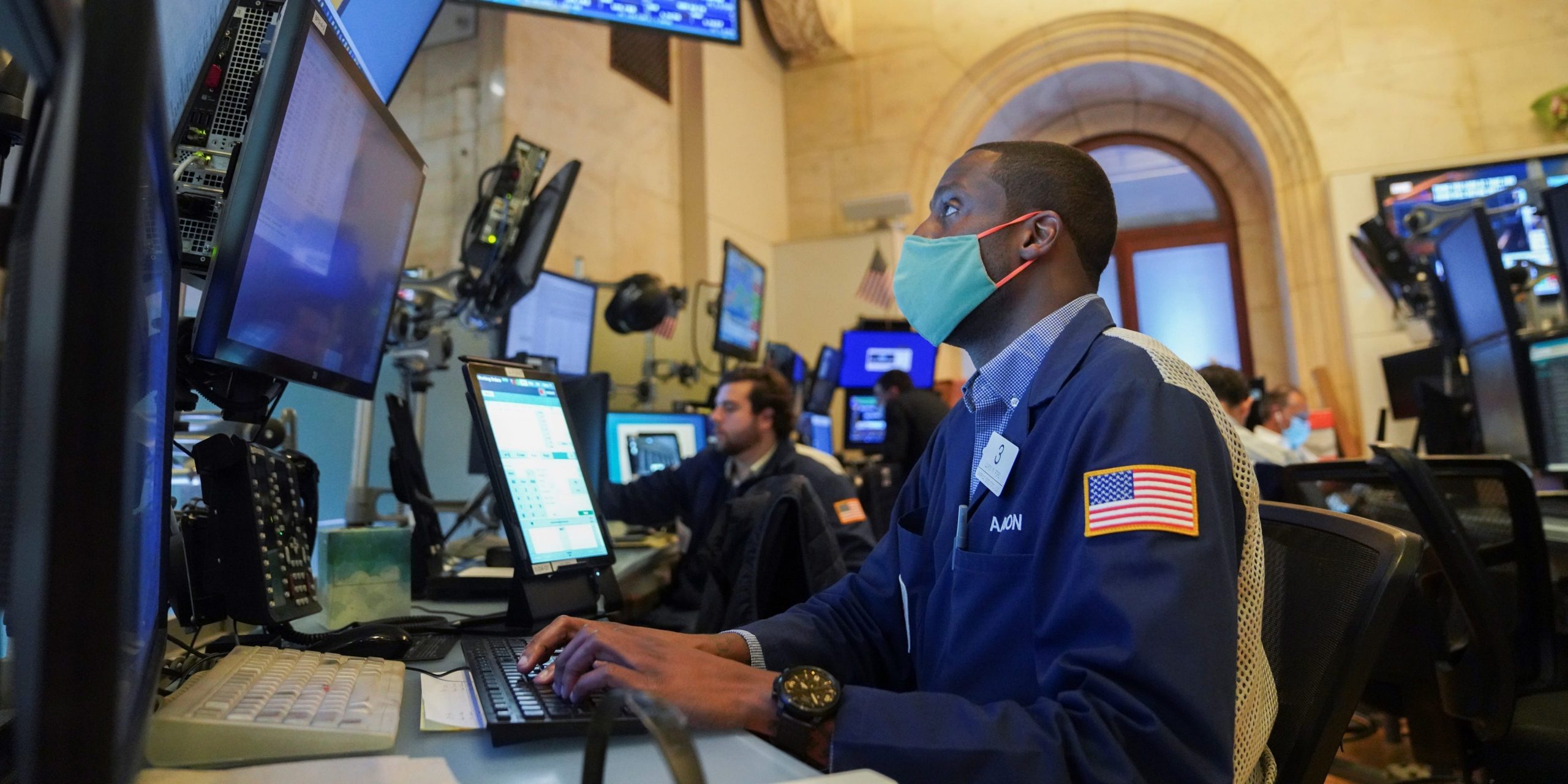 Traders work at the trading floor in the New York Stock Exchange on Aug. 19, 2021.