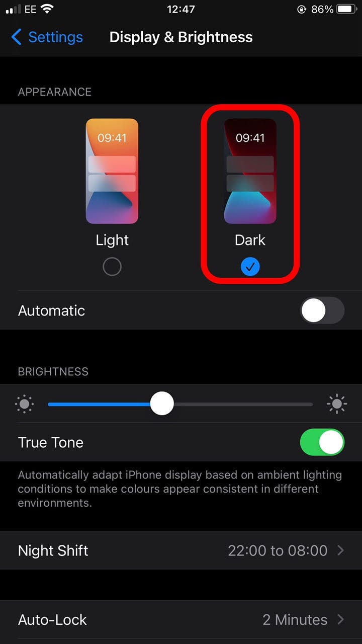 ["chrome-dark-mode-4.png: / An iPhone's Display & Brightness screen with the Dark option selected.]