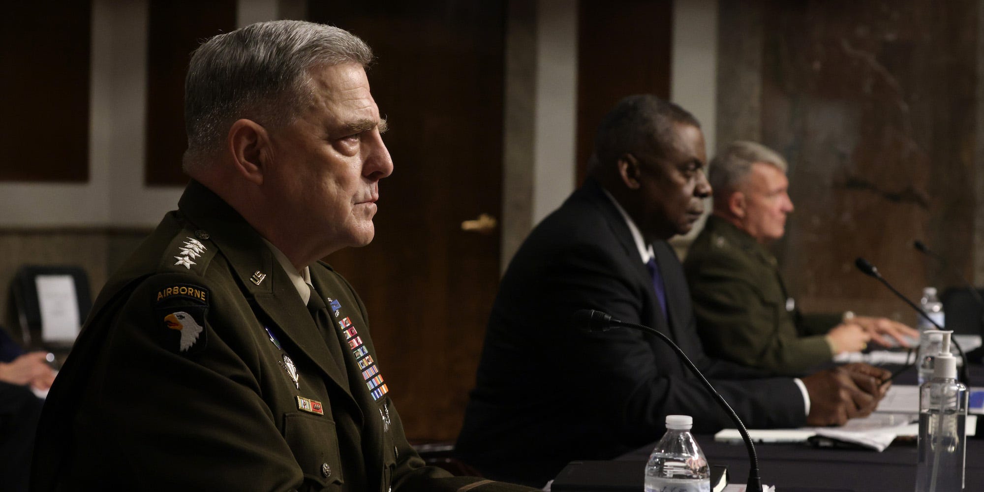 Gens. Mark Milley and Kenneth McKenzie and Defense Secretary Lloyd Austin.