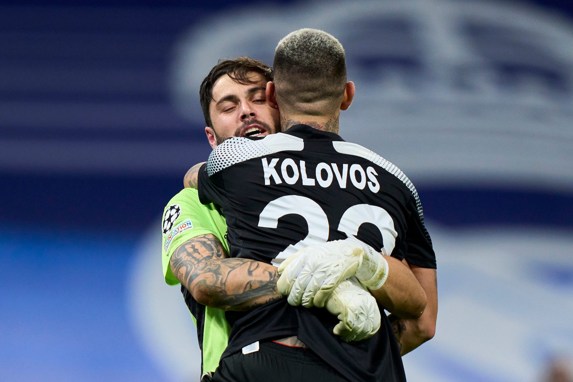 Georgios Athanasiadis and Dimitrios Kolovos of FC Sheriff celebrates victory after the game during the UEFA Champions League group D match between Real Madrid and FC Sheriff at Estadio Santiago Bernabeu on September 28, 2021 in Madrid, Spain