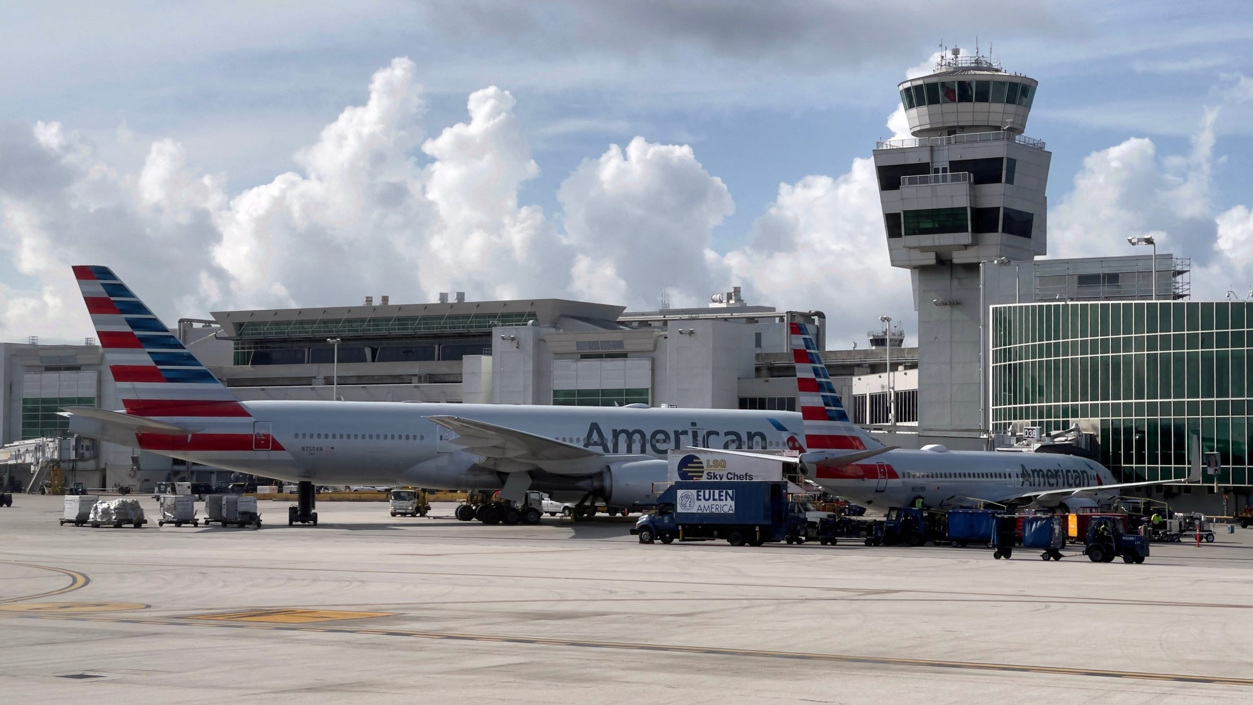 American Airlines planes are seen at the gates at Miami International Airport