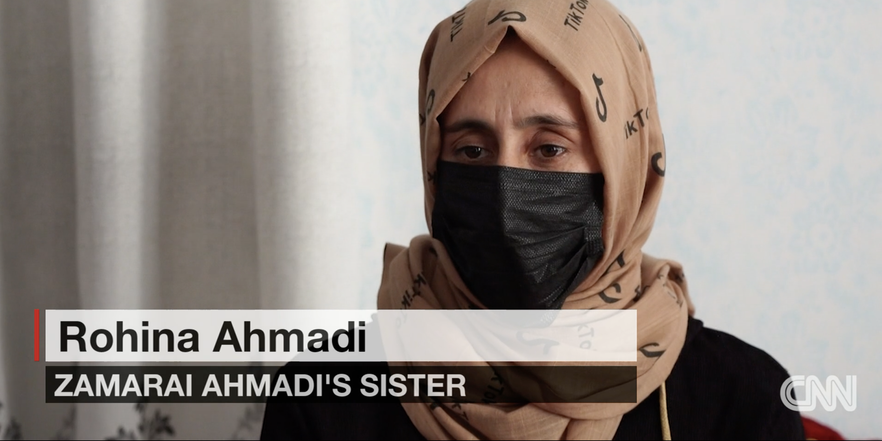 A photo on Zamarai Ahmadi's sister Rohina appearing on cnn to discuss the us drone strke