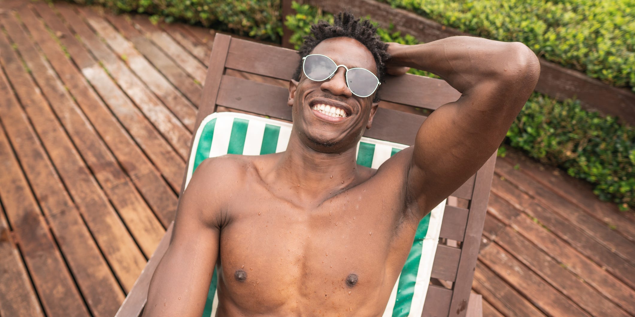 man sunbathing outside