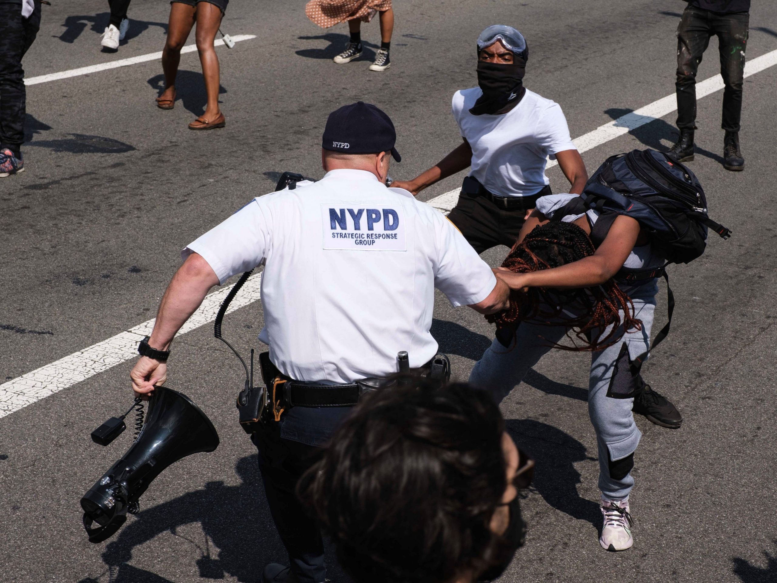 Black Lives Matter protesters are arrested by NYPD officers