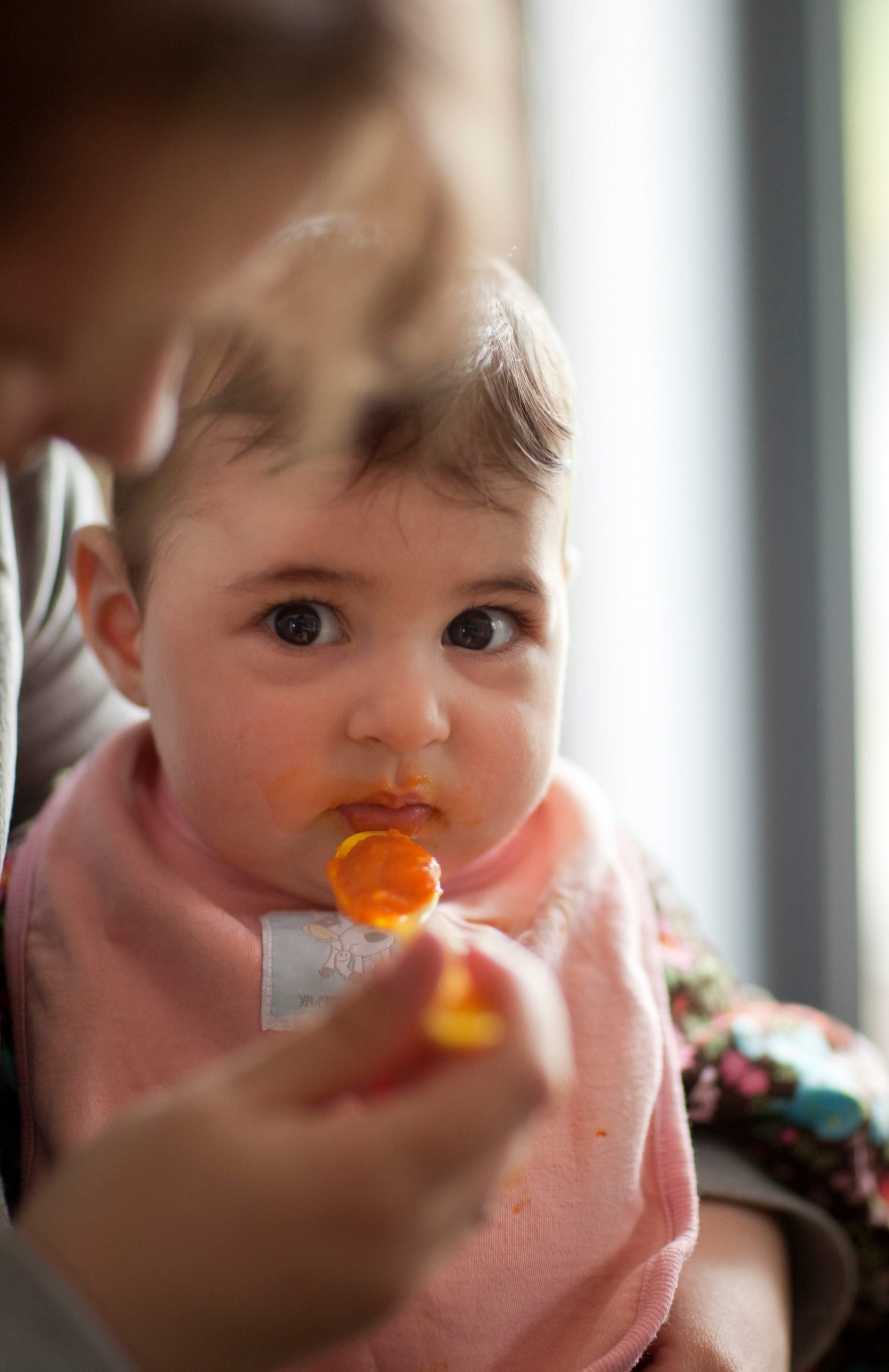 baby eating baby food