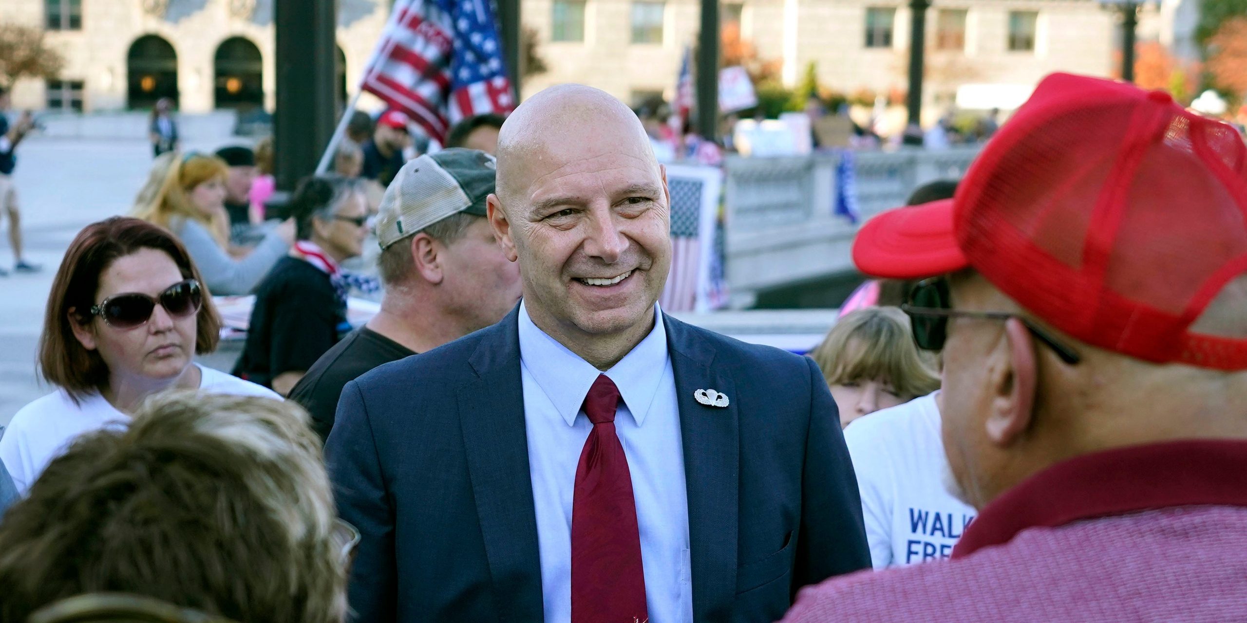 Pennsylvania state Sen. Doug Mastriano smiles in a suit
