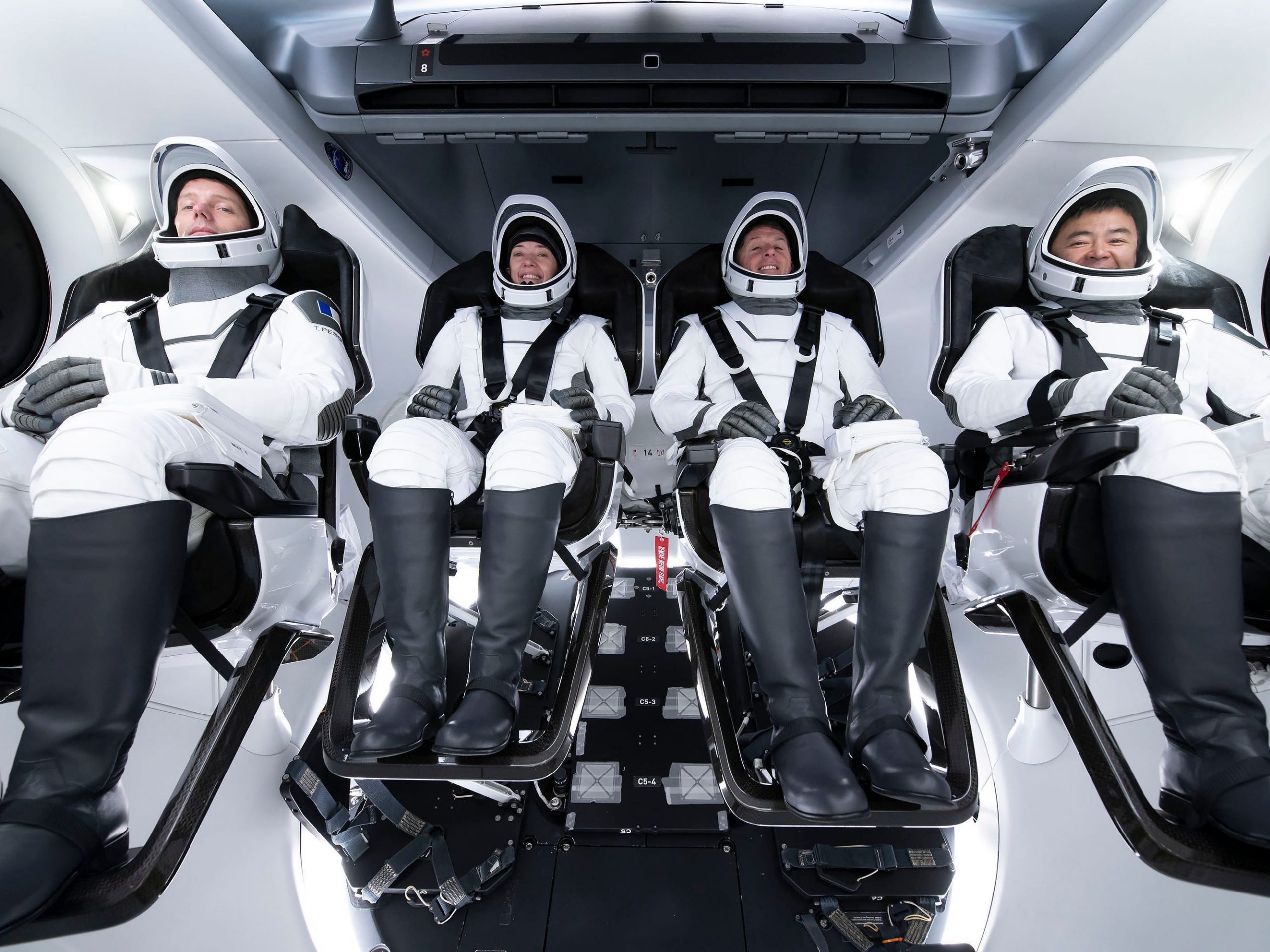 crew 2 astronauts crew dragon spaceship