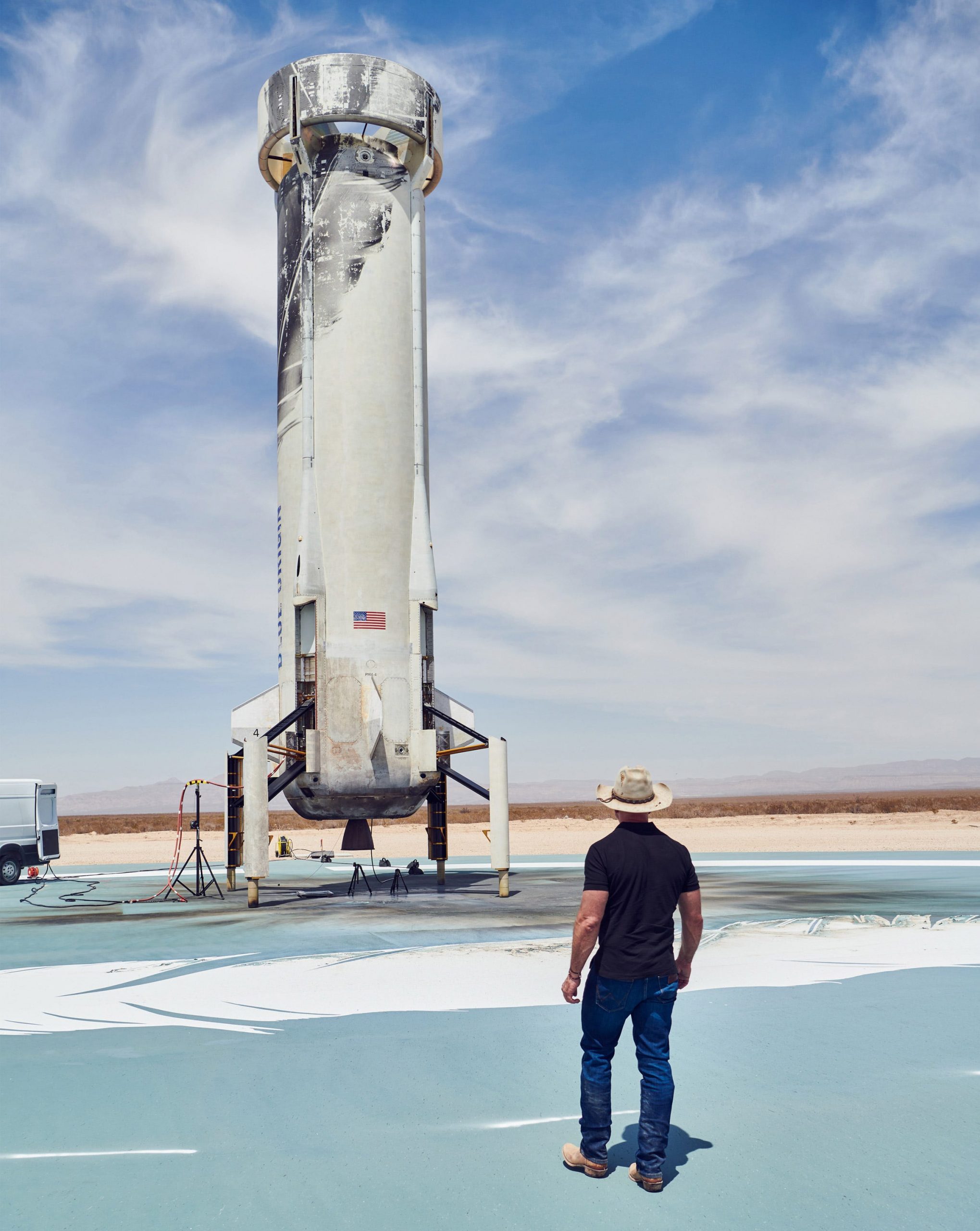 jeff bezos inspects blue origin new shepard rocket booster