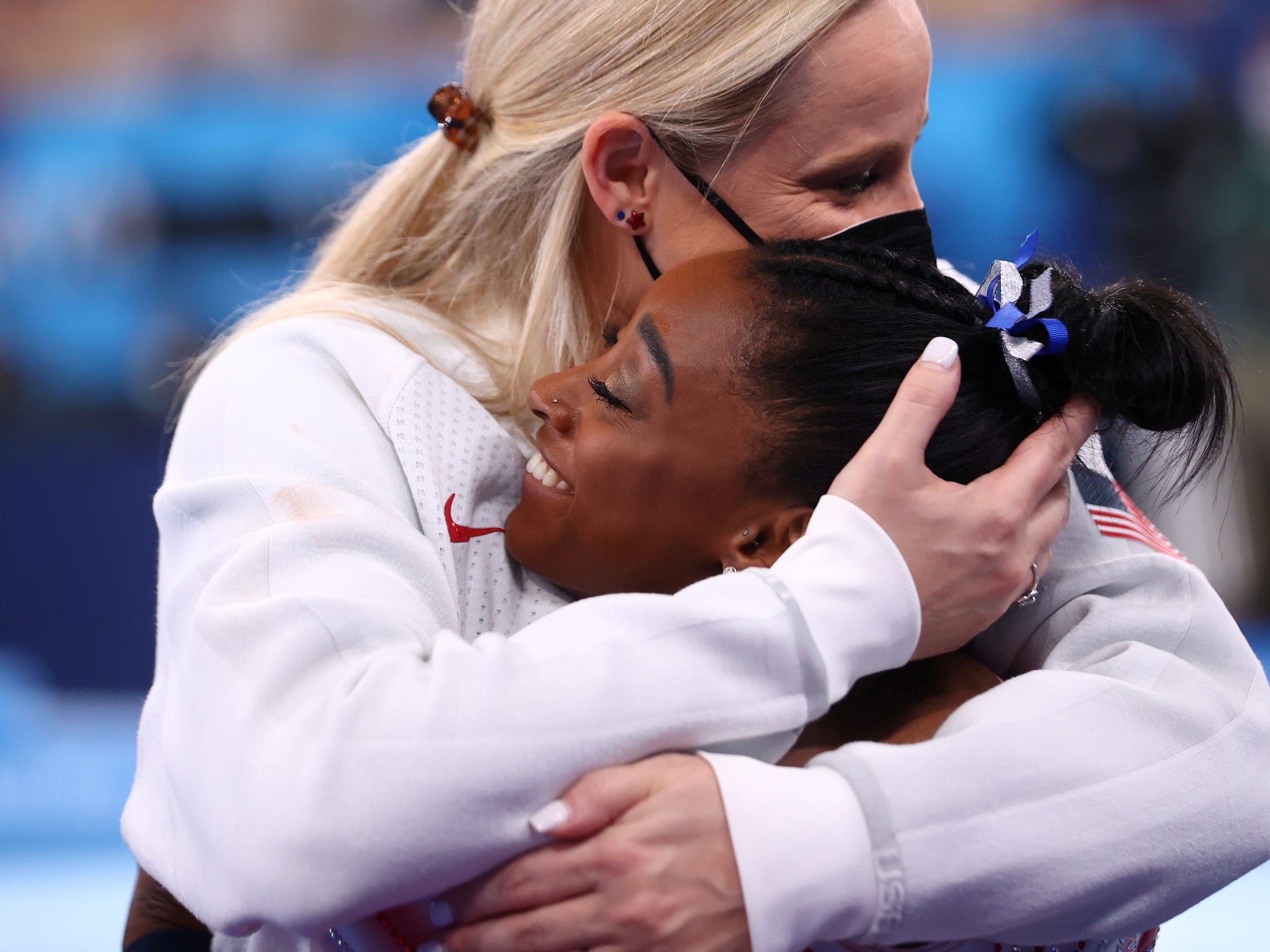 Simone Biles hugs her coach, Cecile Canqueteau-Landi.