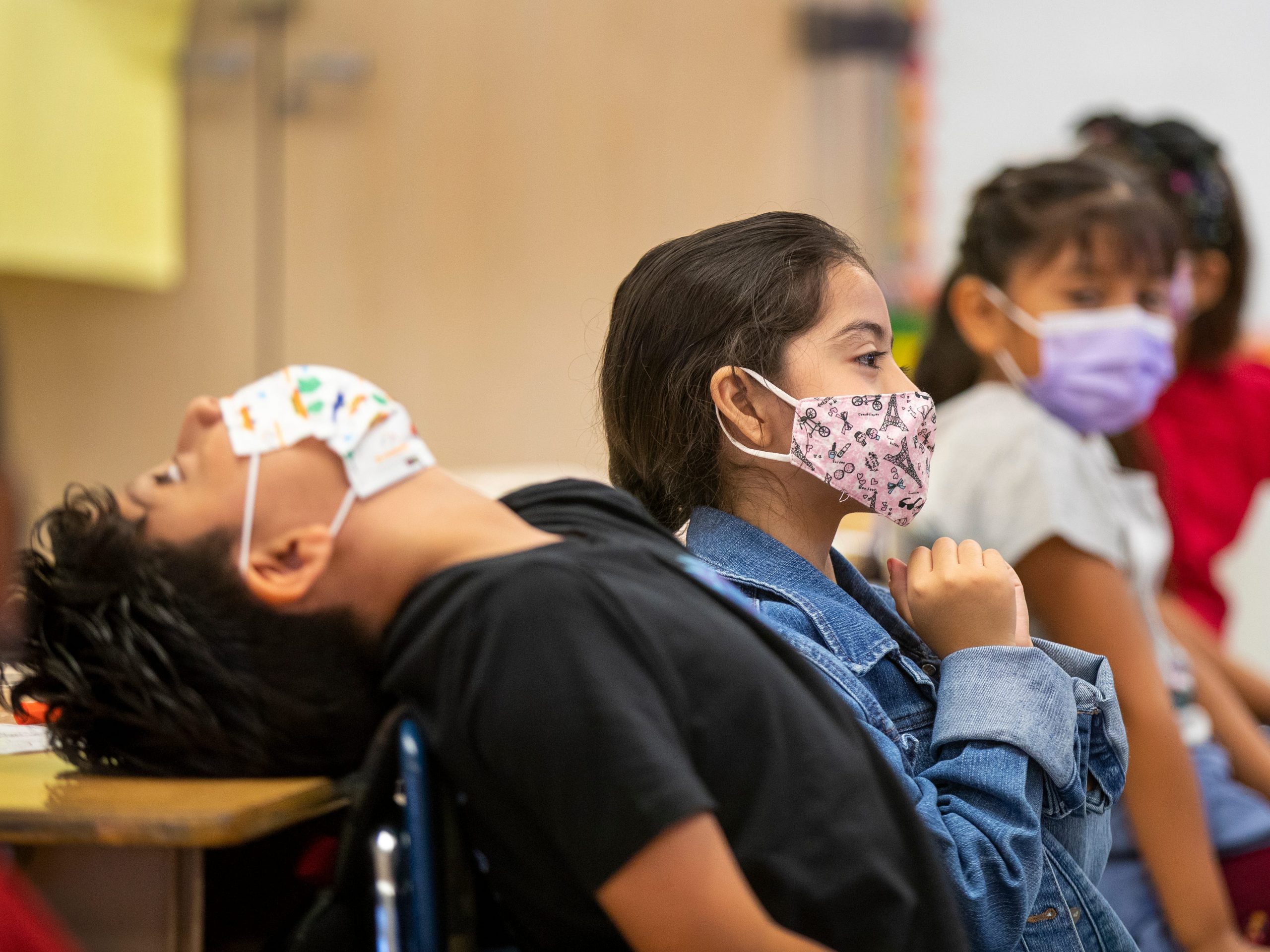 Kids in masks returning to school