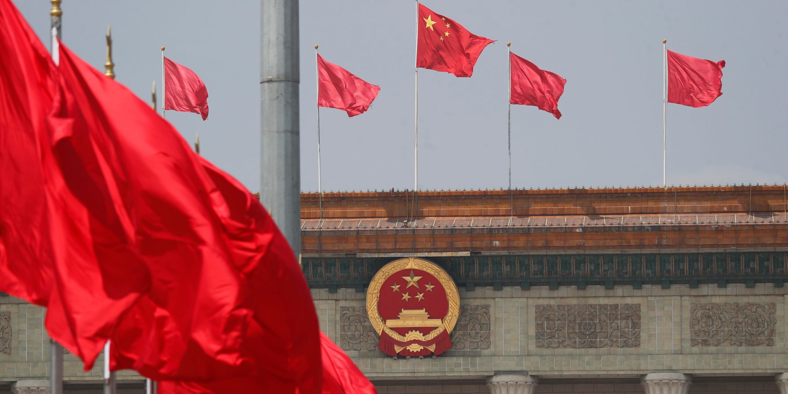 Red flags fly in front of the Great Hall of the People as the third session of the 13th National People's Congress (NPC) holds opening meeting on May 22, 2020 in Beijing, China.
