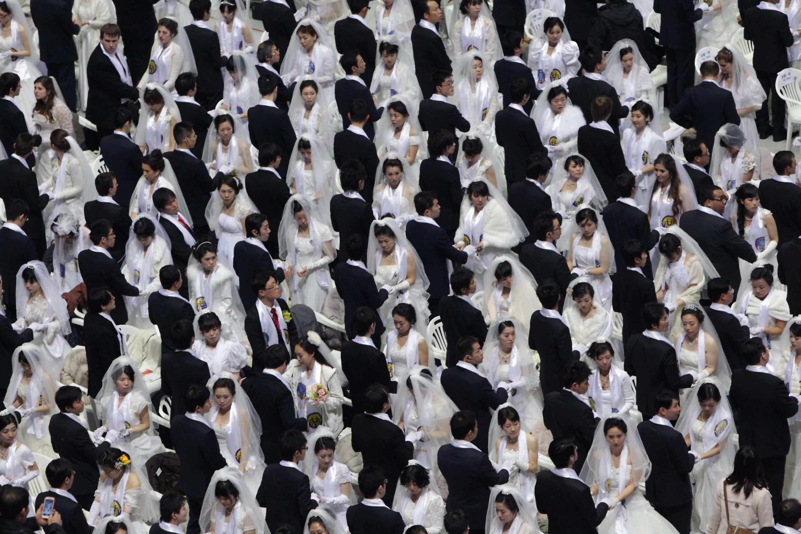 Thousands of couples take part in a mass wedding ceremony at Cheongshim Peace World Center on February 17, 2013 in Gapyeong-gun, South Korea.