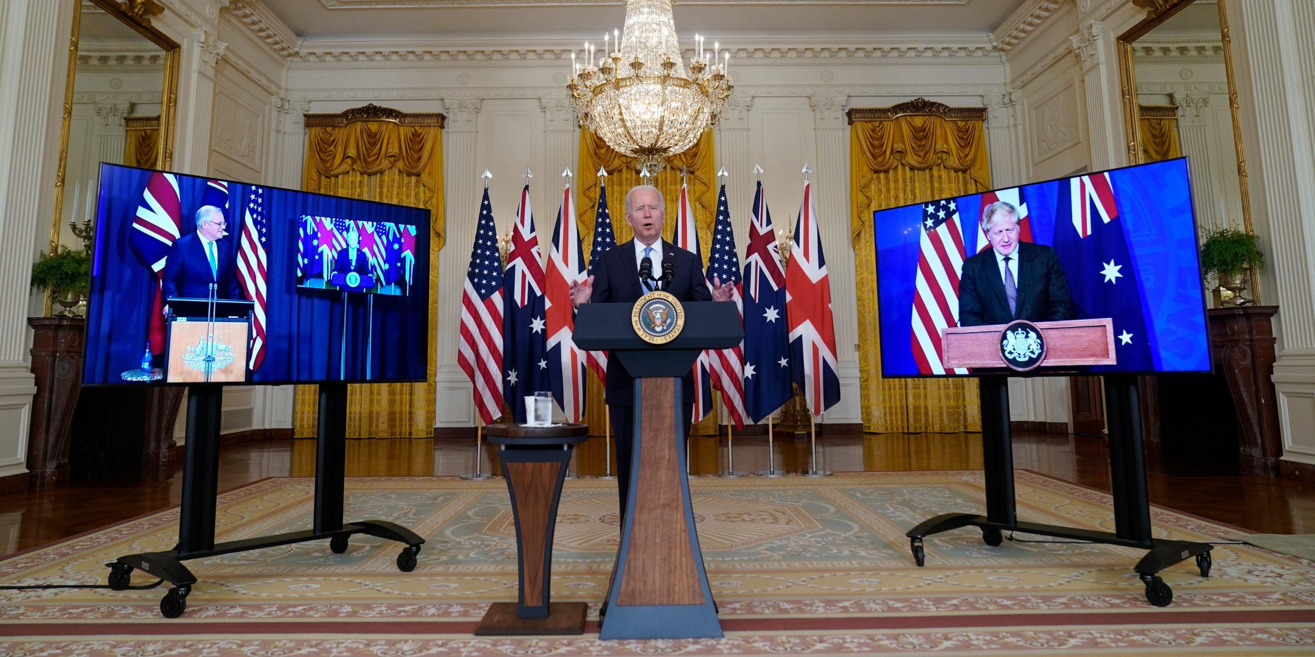 President Joe Biden, joined virtually by Australian Prime Minister Scott Morrison and British Prime Minister Boris Johnson, announces the new trilateral security initiative “AUKUS” at the White House on Wednesday, Sept. 15, 2021.