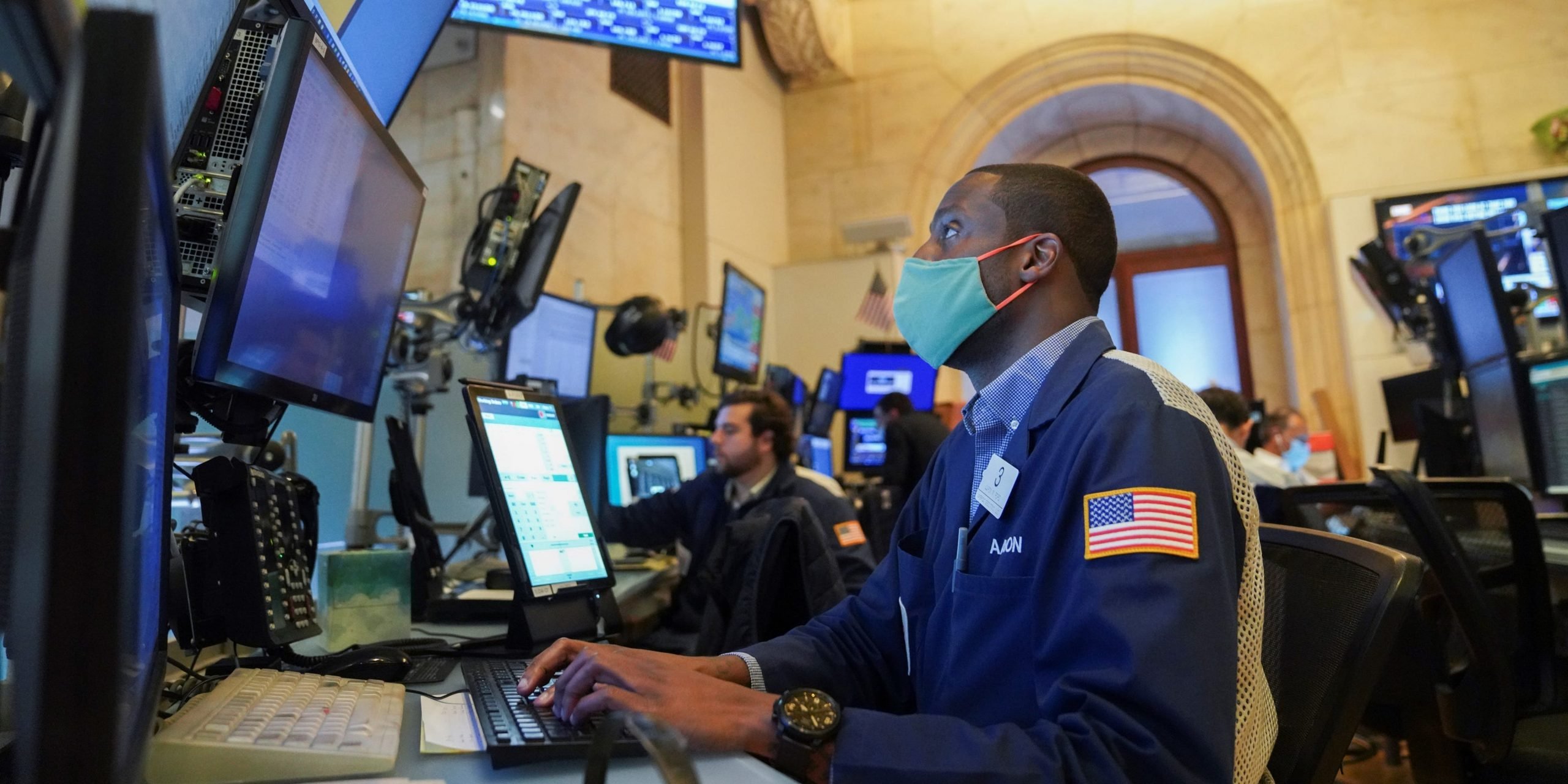 Traders work at the trading floor in the New York Stock Exchange on Aug. 19, 2021.