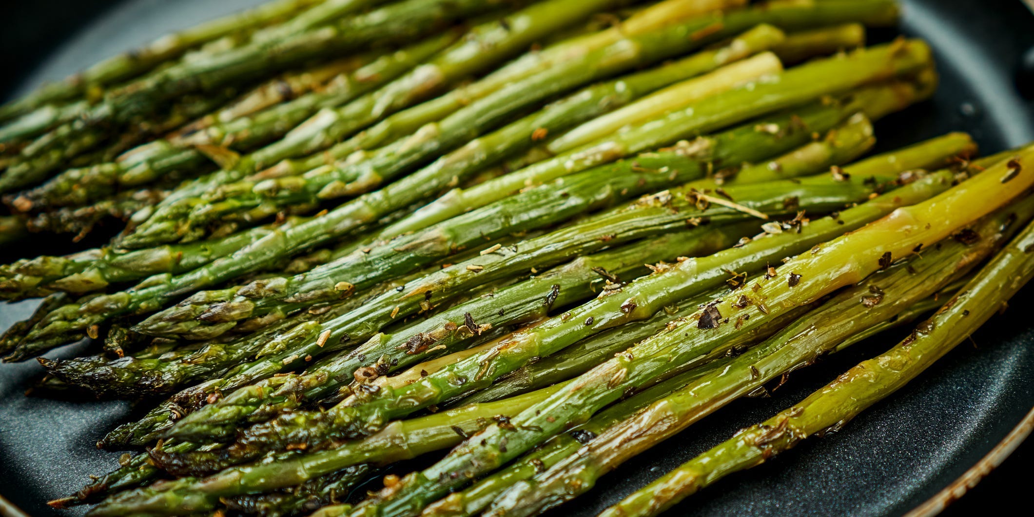 A large plate of roasted asparagus