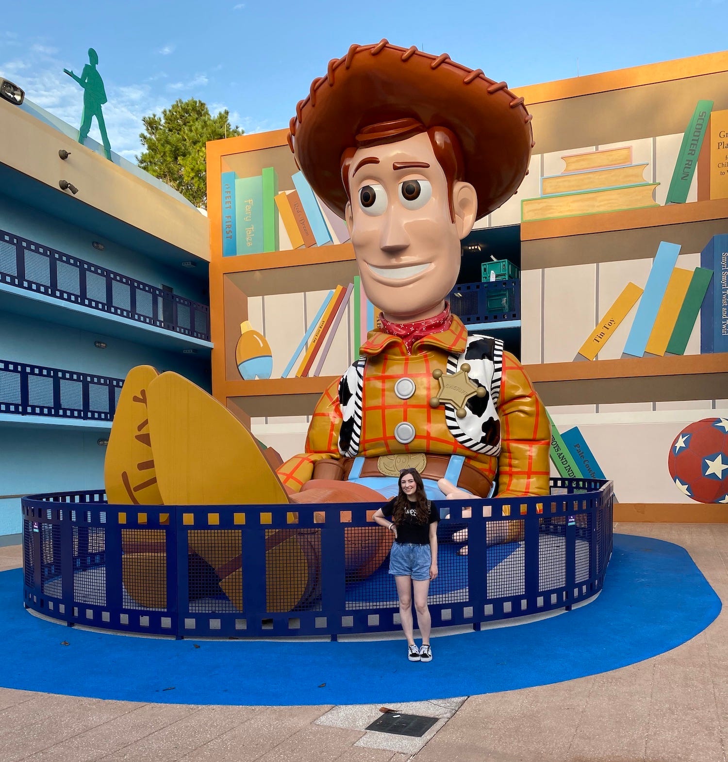 Insider reporter Amanda Krause poses with a "Toy Story" statue at Disney World.