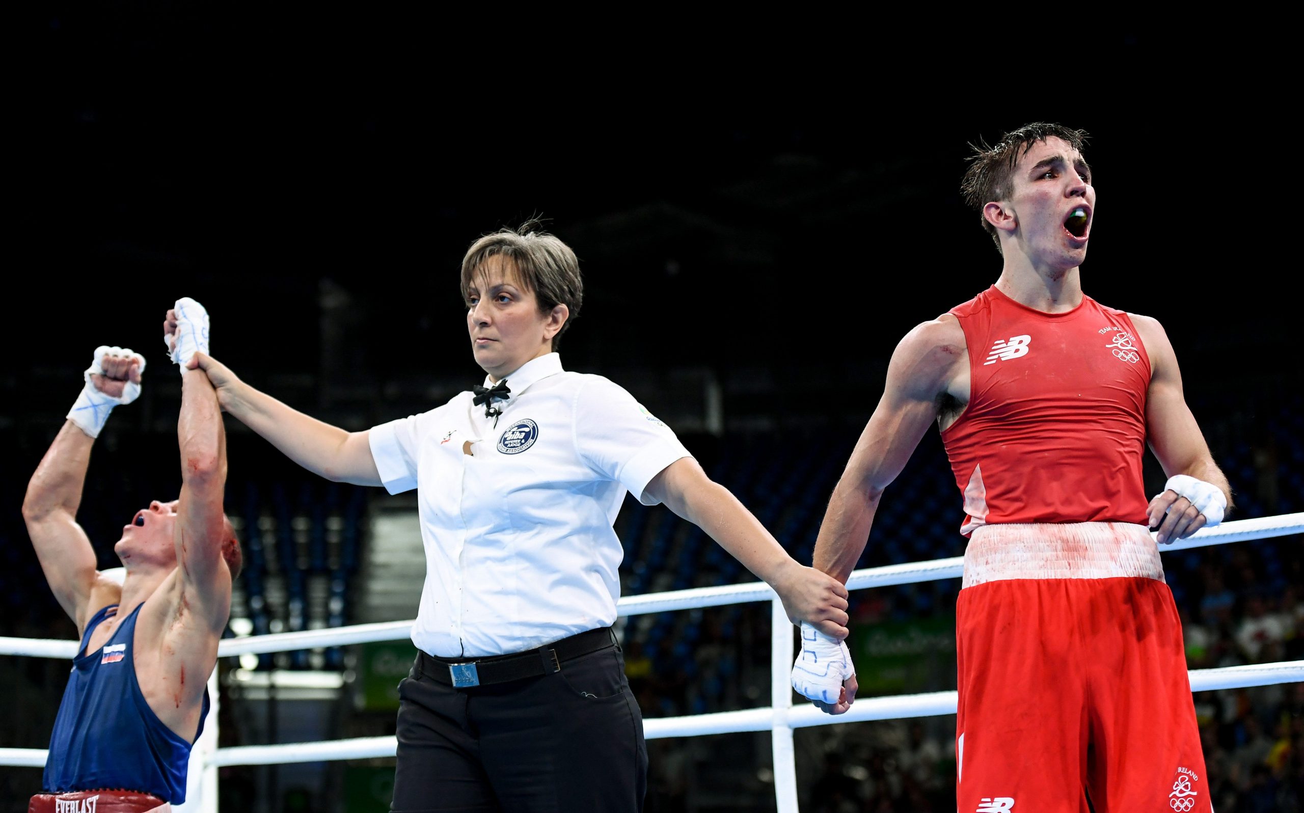 Michael Conlan of Ireland (right) reacts following his defeat to Vladimir Nikitin of Russia during the 2016 Rio Olympics.