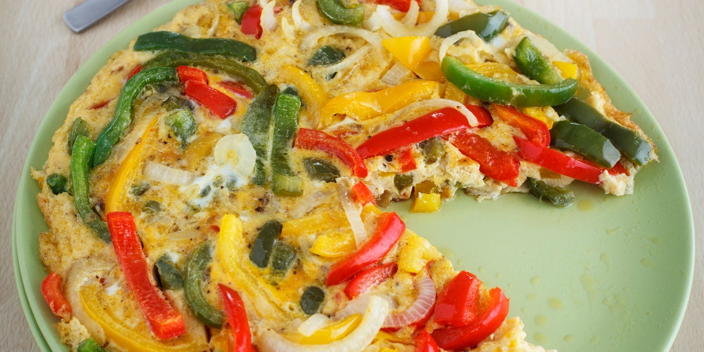 Omelette or frittata with green and red bell peppers and onions