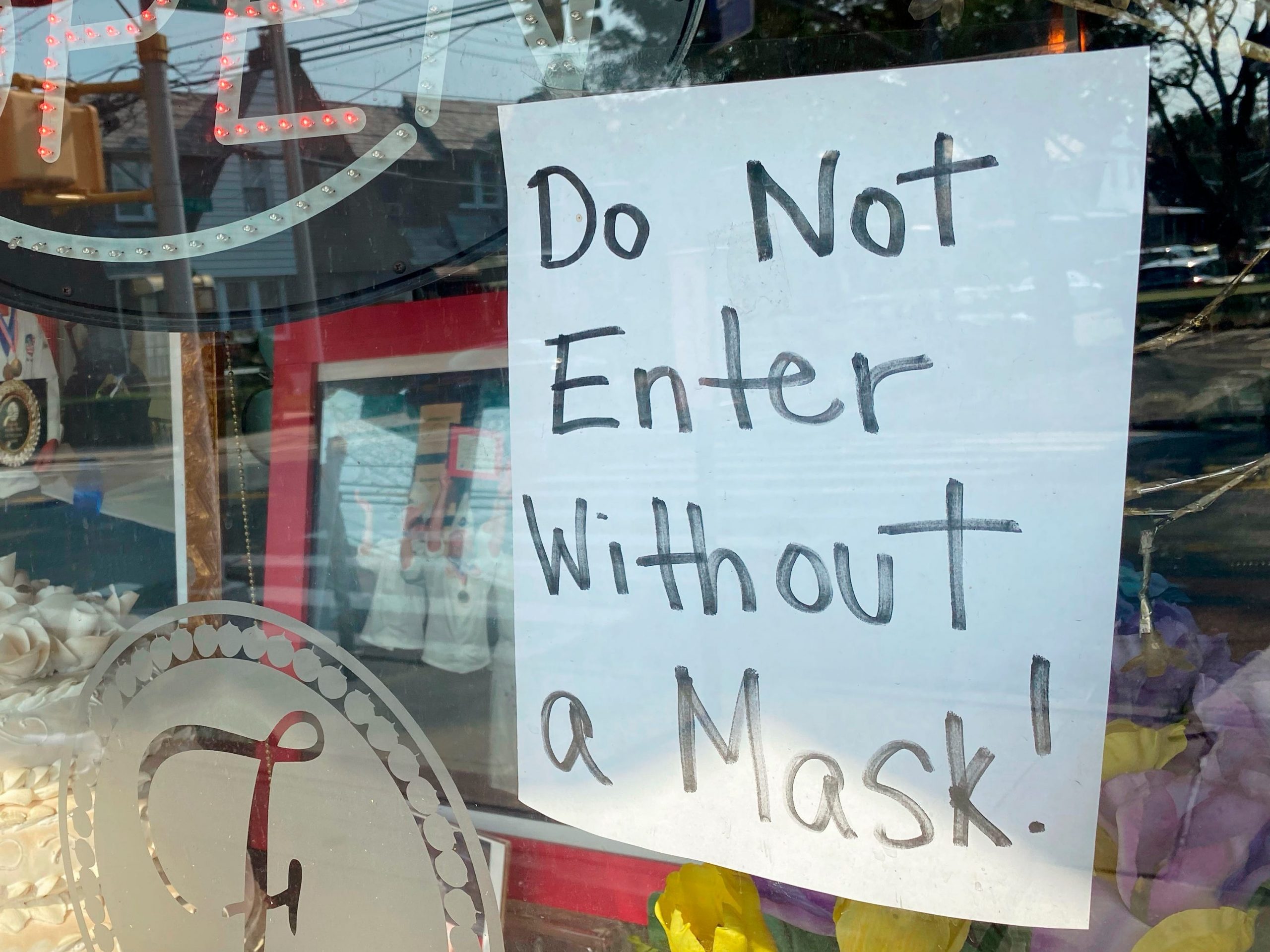 Do not enter without mask sign at Framboise Bakery, Queens, New York.