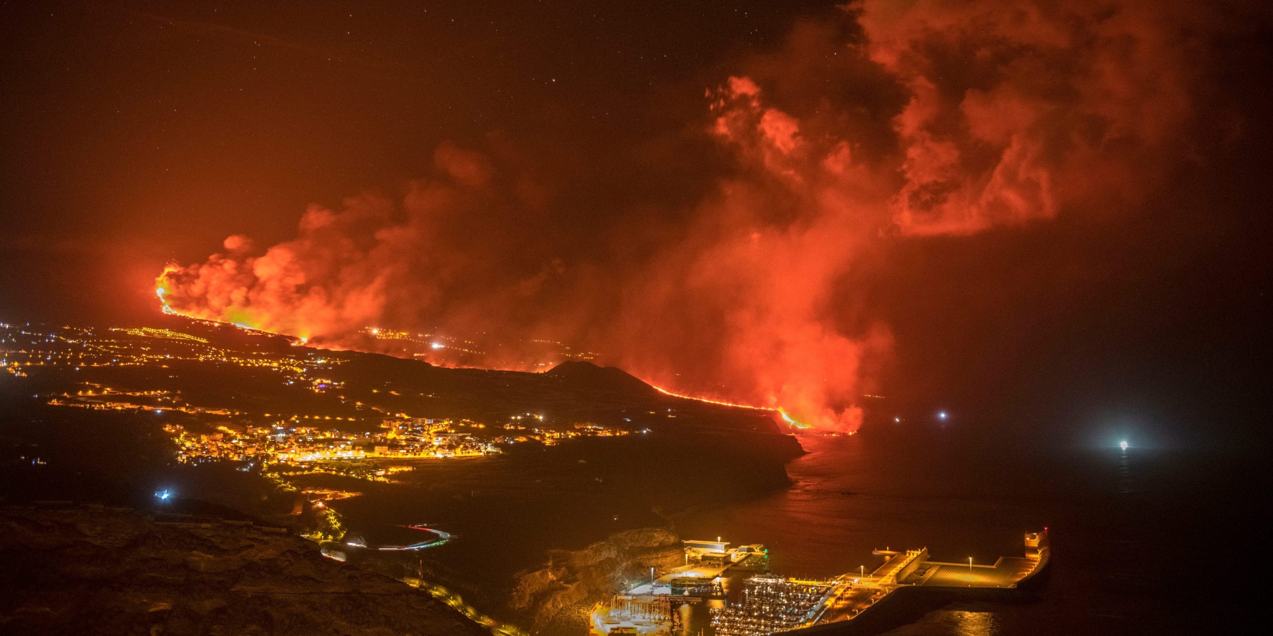 Lava from a volcano reaches the sea on the Canary island of La Palma, Spain, Wednesday, Sept. 29, 2021. Lava from a volcano that erupted Sept. 19 on Spain's Canary Islands has finally reached the Atlantic Ocean after wiping out hundreds of homes and forcing the evacuation of thousands of residents.