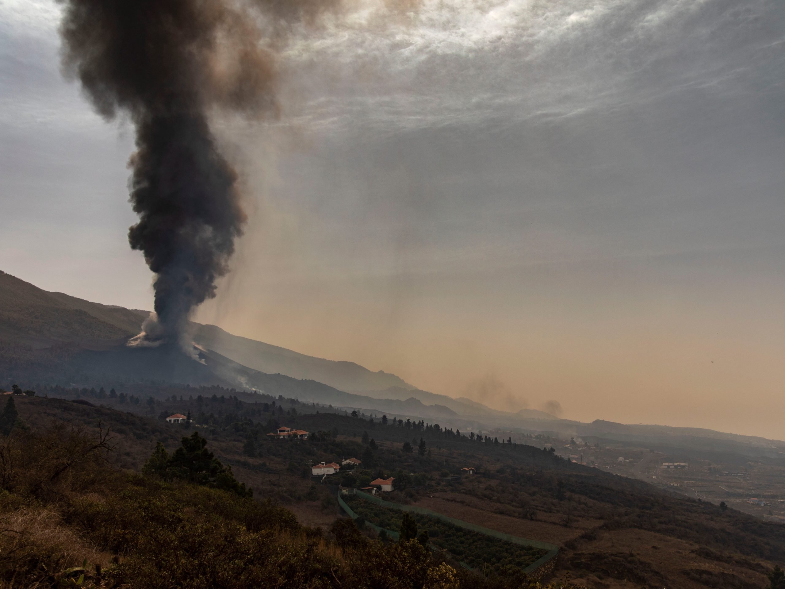 The Cumbre Vieja volcano from the Aridane valley, on 1 October 2021, in Tacande de Abajo, La Palma, Santa Cruz de Tenerife, Canary Islands, Spain. This Friday a new mouth has been opened in the volcano and the lava expelled by the volcano flows through two new lava flows that go down parallel to the main one