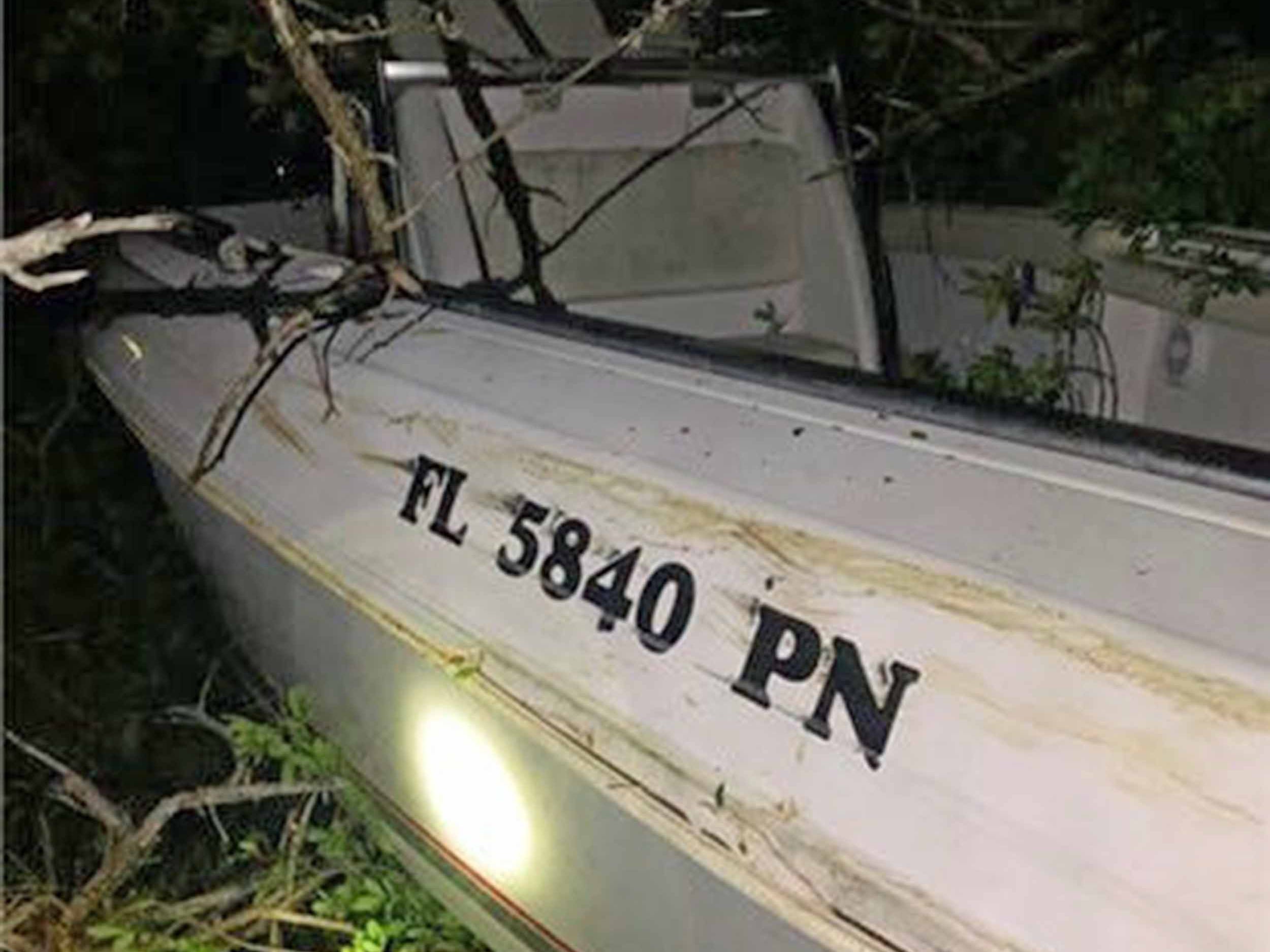 A view of the boat that police in Florida say was driven onshore by Paul Rae, who was arrested on suspicion of boating under the influence.