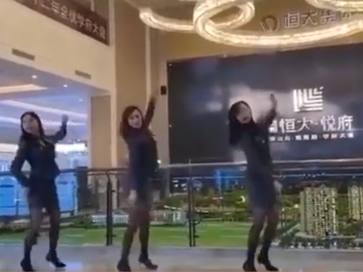 china evergrande female staff dancing