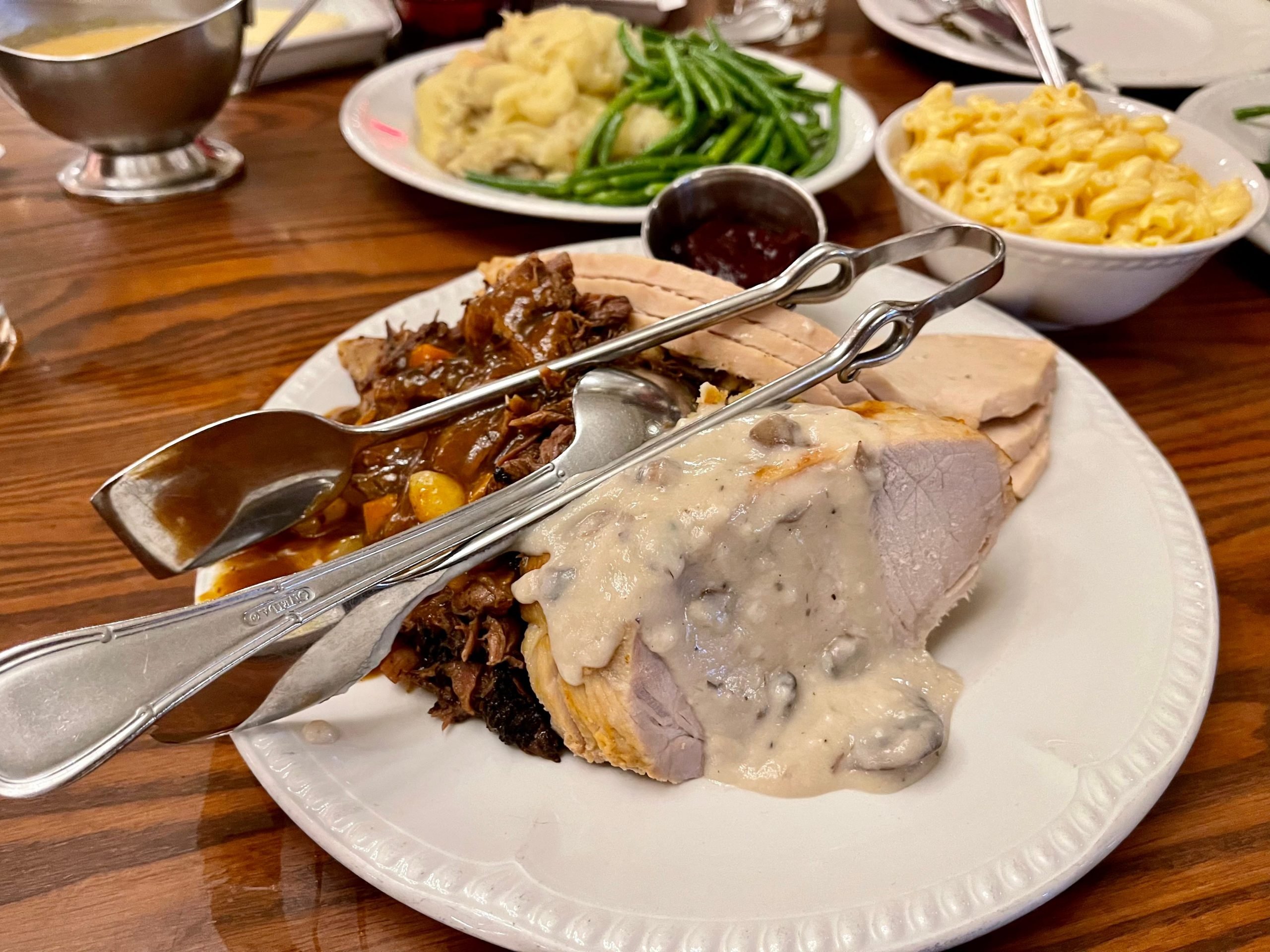 plate of dinner at diamond horseshoe at magic kingdom