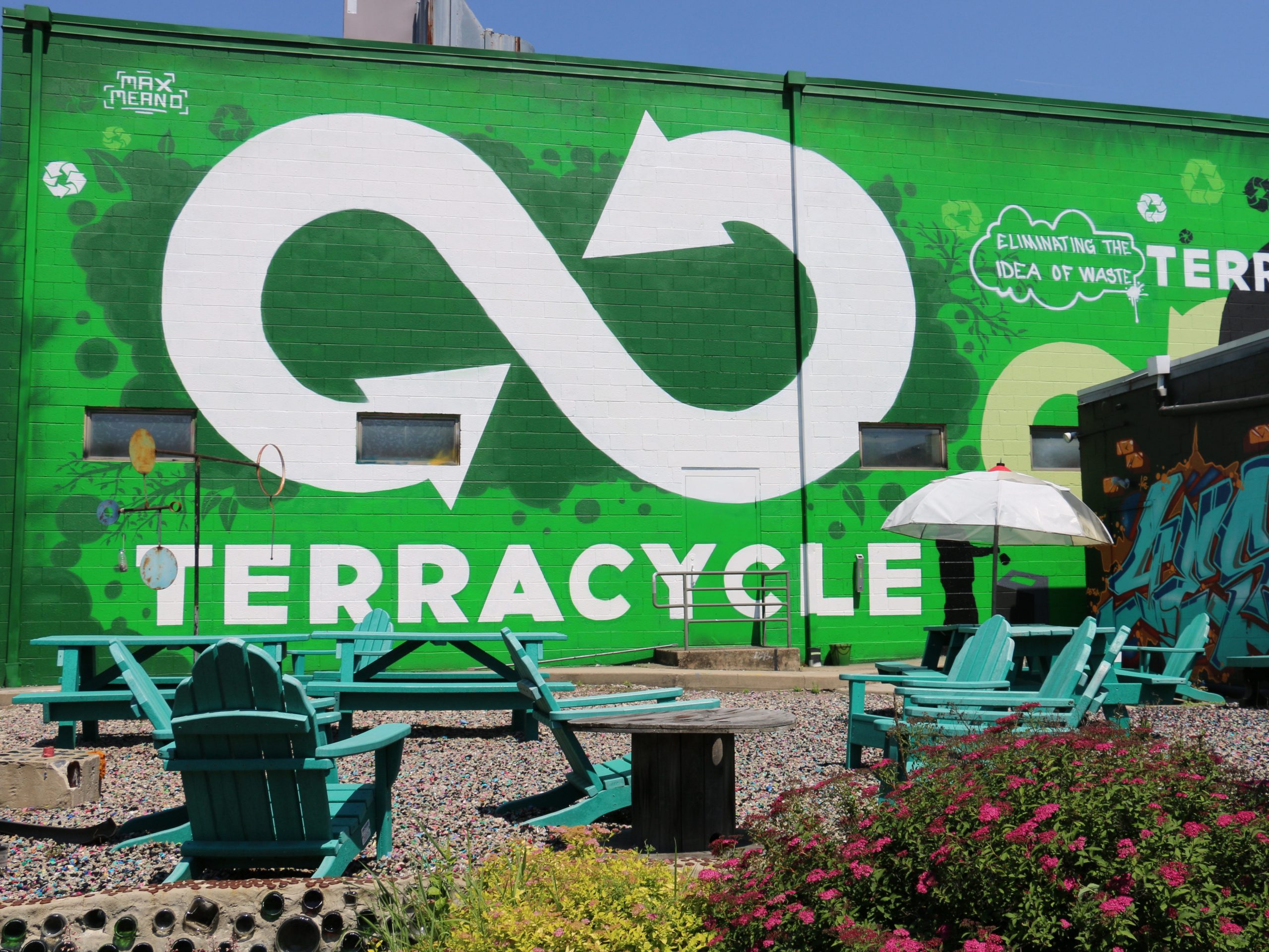 the TerraCycle building with a green wall and logo