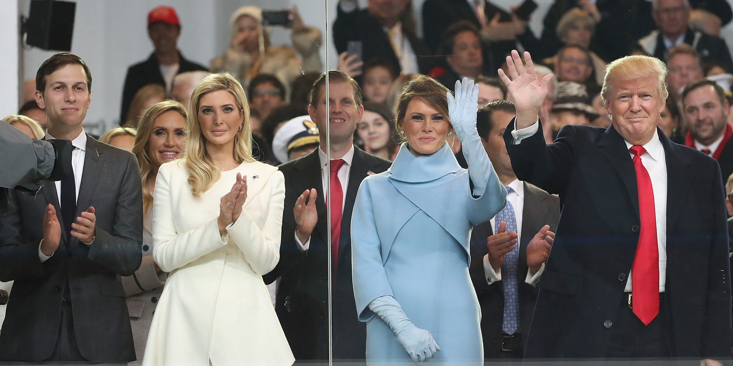 U.S. President Donald Trump (R), stands with his wife first lady Melania Trump, daughter Ivanka Trump and her husband Jared Kushner, inside of the inaugural parade reviewing stand in front of the White House on January 20, 2017 in Washington, DC. Donald Trump was sworn in as the nation's 45th president today.