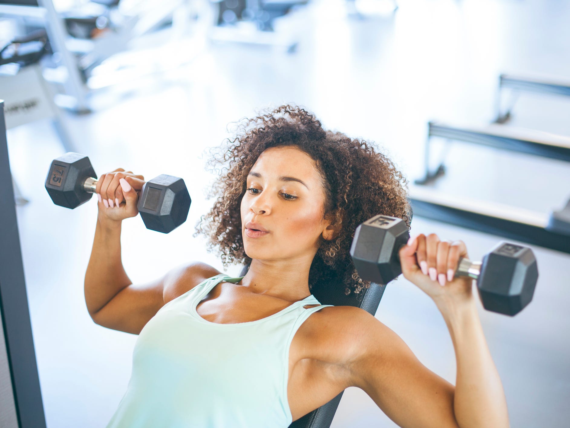 women lifting weights