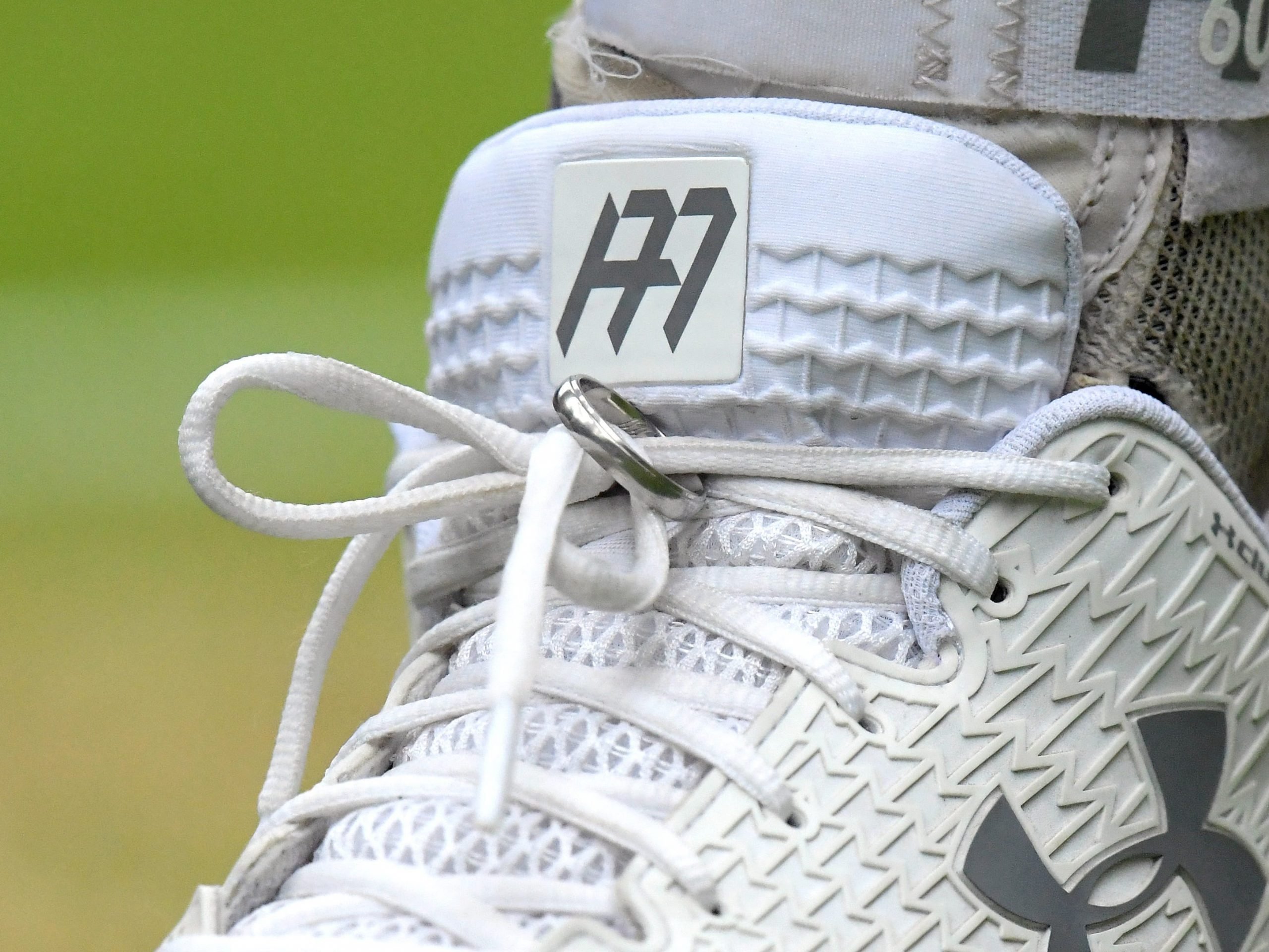 Andy Murray's boot with a wedding ring tied through the laces