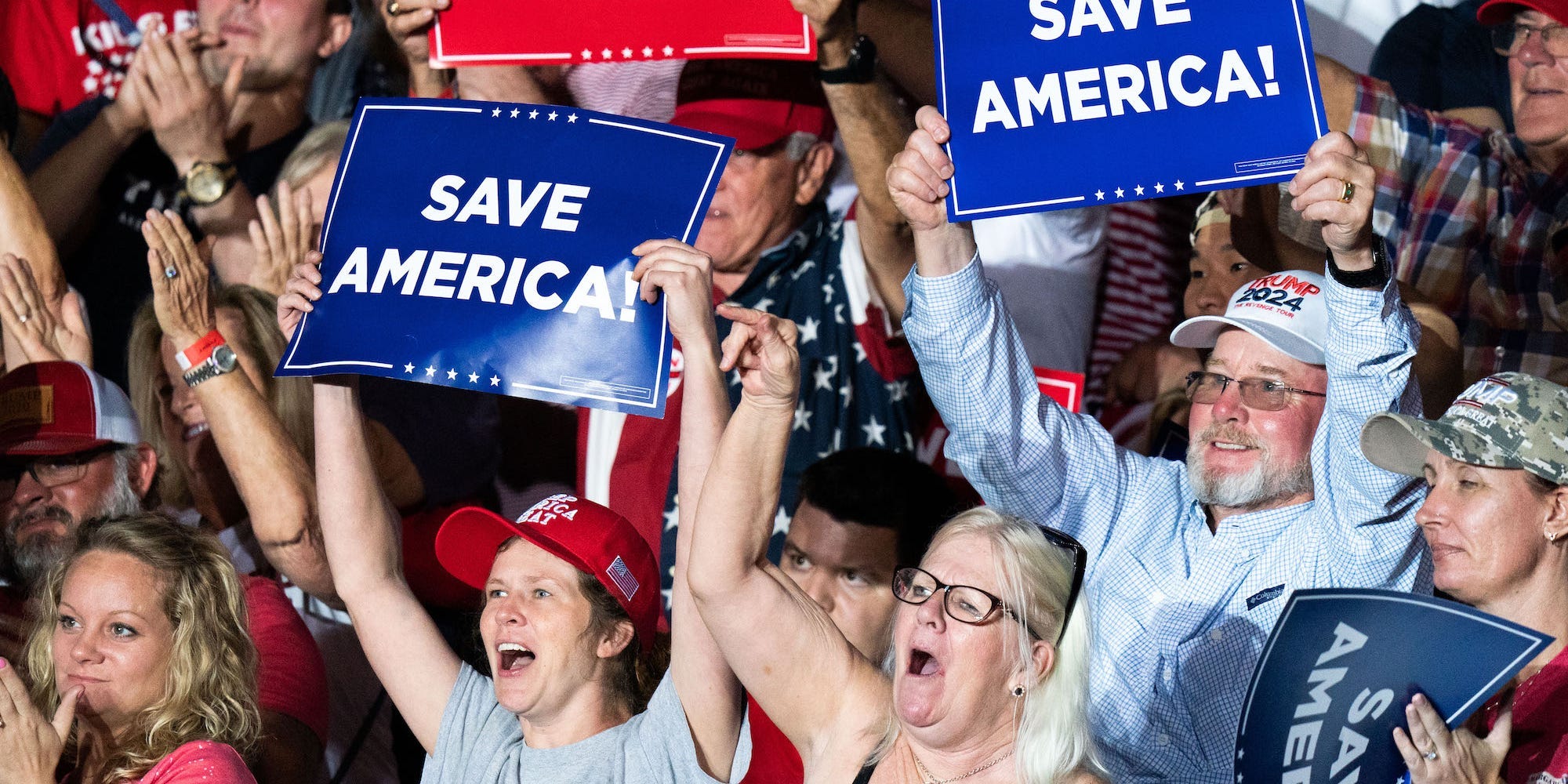 Supporters of former President Donald Trump cheer at a rally on September 25, 2021 in Perry, Georgia.