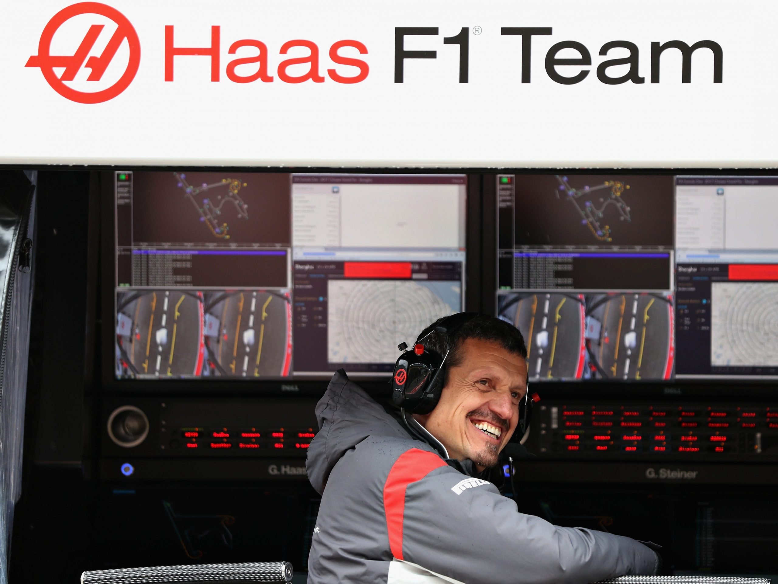 Haas F1 Team Principal Guenther Steiner sits on the pit wall gantry during practice for the Formula One Grand Prix of China