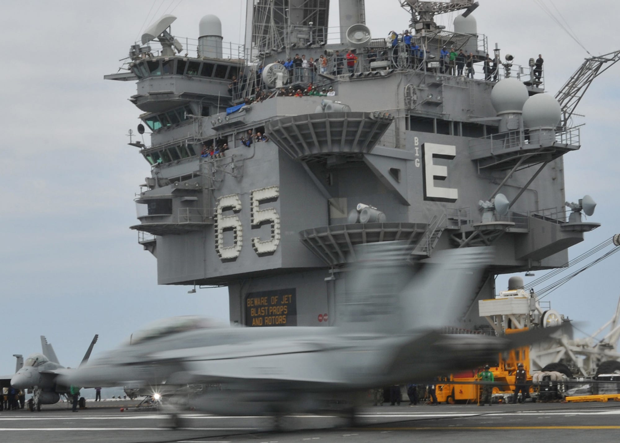 F/A-18F Super Hornet fighter jet lands on aircraft carrier Enterprise