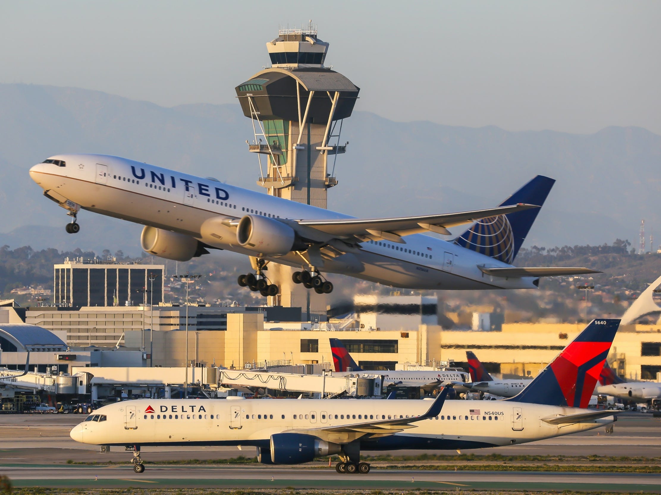 United Airlines and Delta Air Lines aircraft at Los Angeles International Airport.